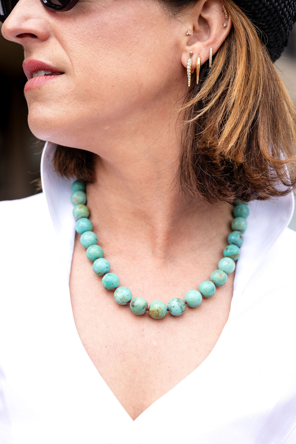 The Turquoise Edit - Hilary wearing a turquoise beaded necklace