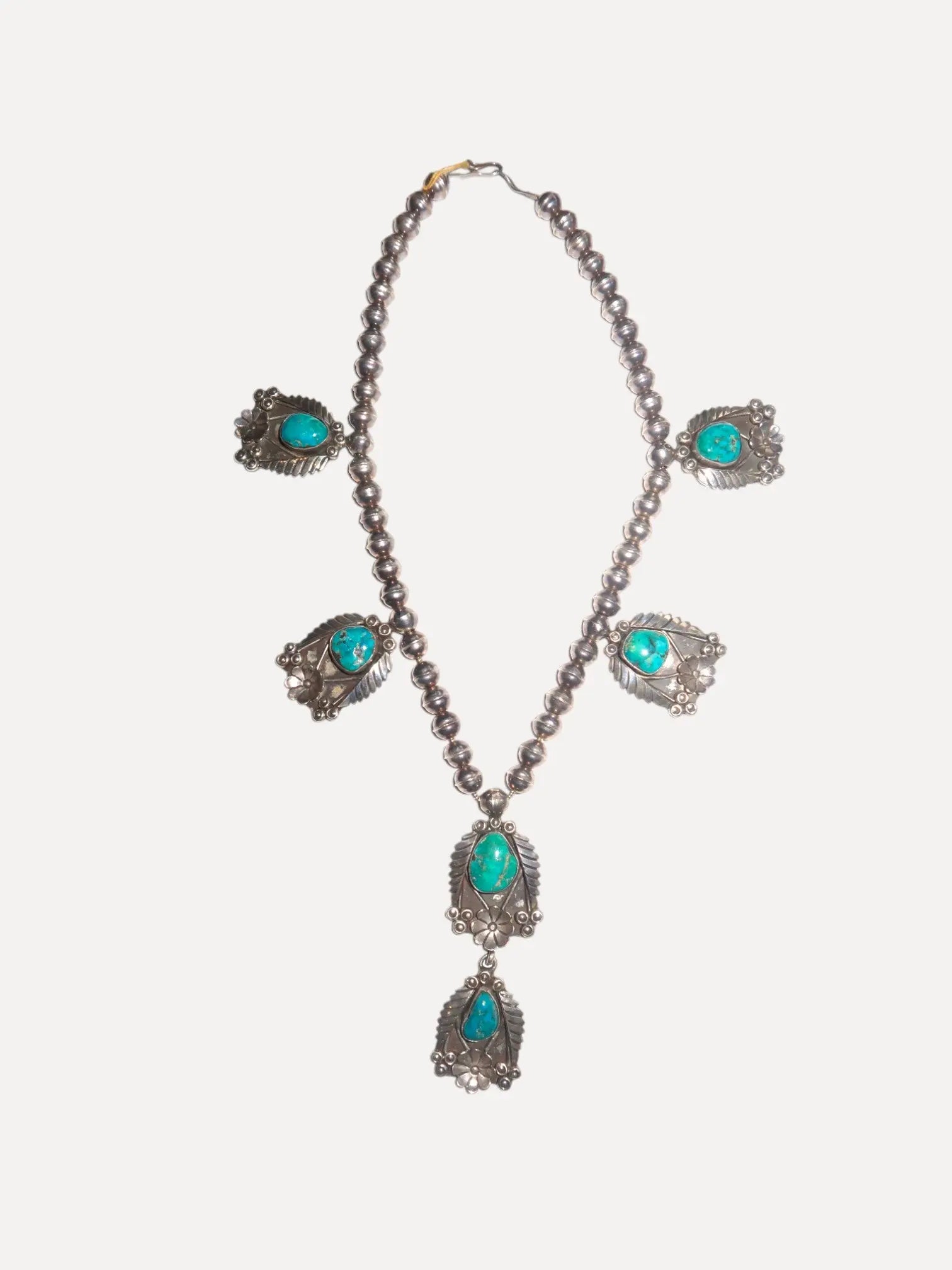 1960s Floral Station Necklace, Navajo 1960s Floral Station Necklace, Navajo Native American Collection Native American Collection  Squash Blossom Vail