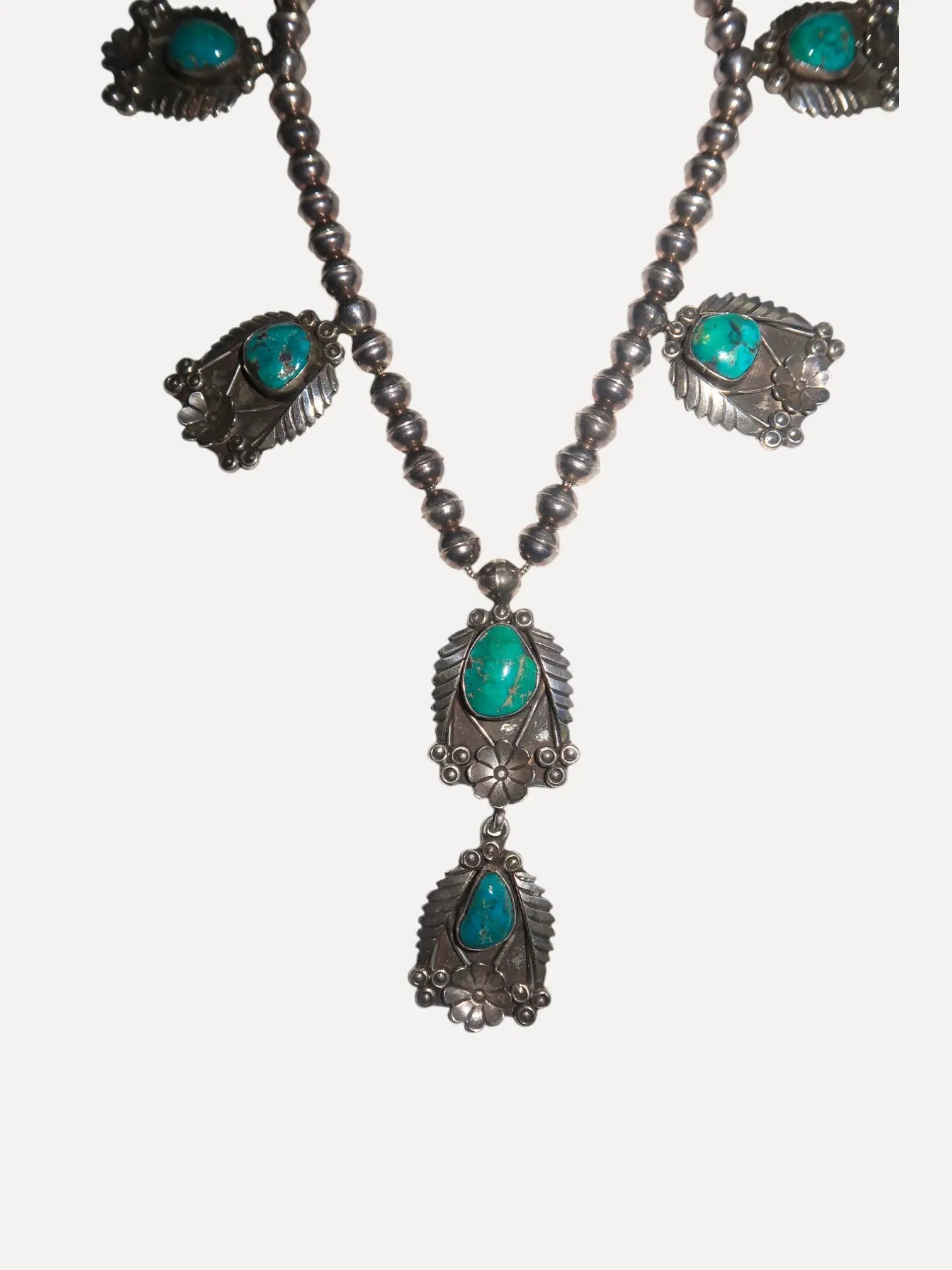 1960s Floral Station Necklace, Navajo 1960s Floral Station Necklace, Navajo Native American Collection Native American Collection  Squash Blossom Vail