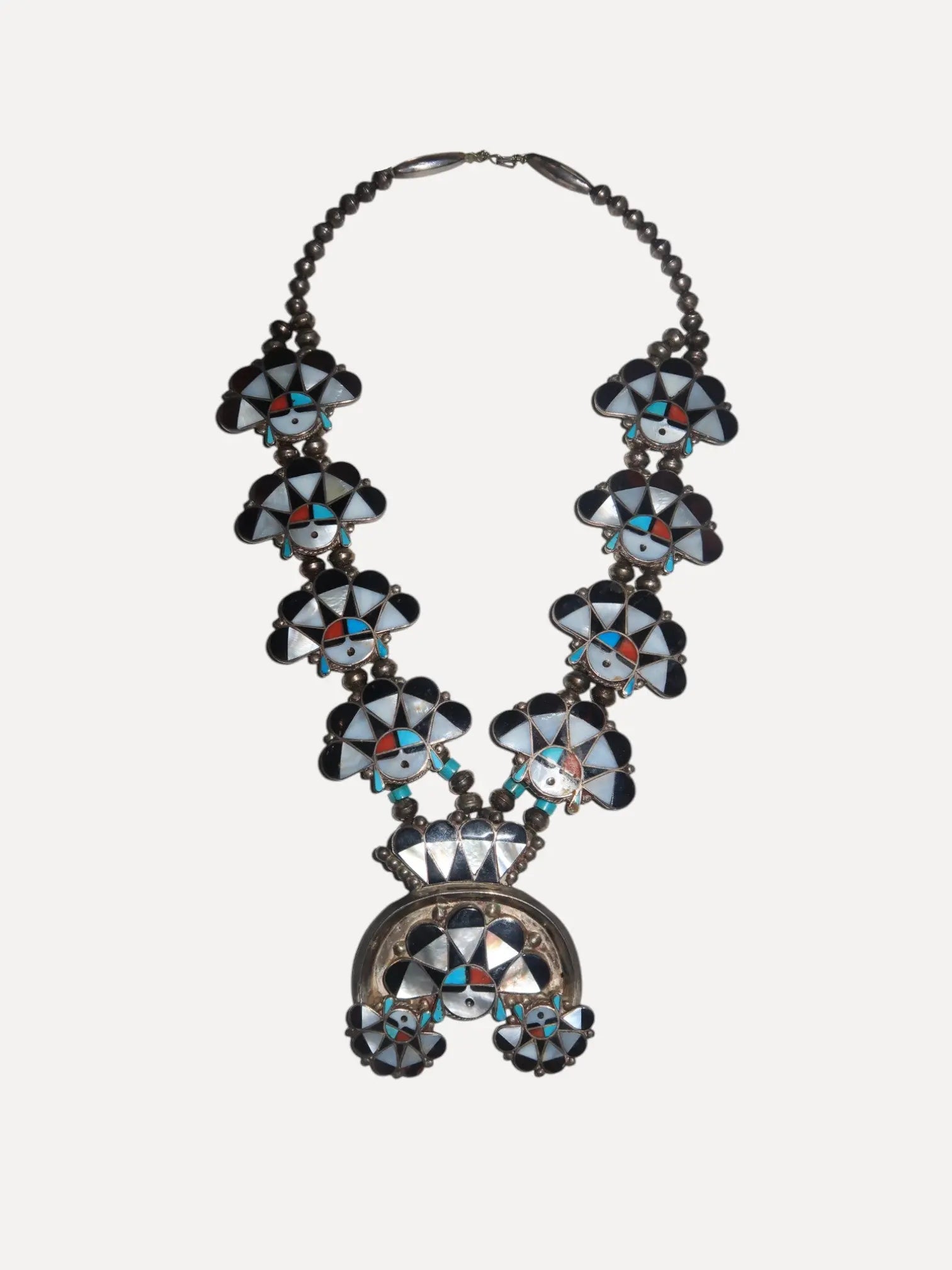 1970s Zuni Sunface Squash Blossom 1970s Zuni Sunface Squash Blossom Native American Collection Native American Collection  Squash Blossom Vail