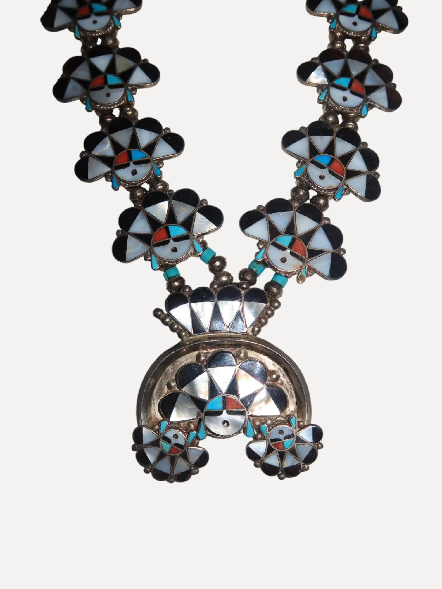 1970s Zuni Sunface Squash Blossom 1970s Zuni Sunface Squash Blossom Native American Collection Native American Collection  Squash Blossom Vail