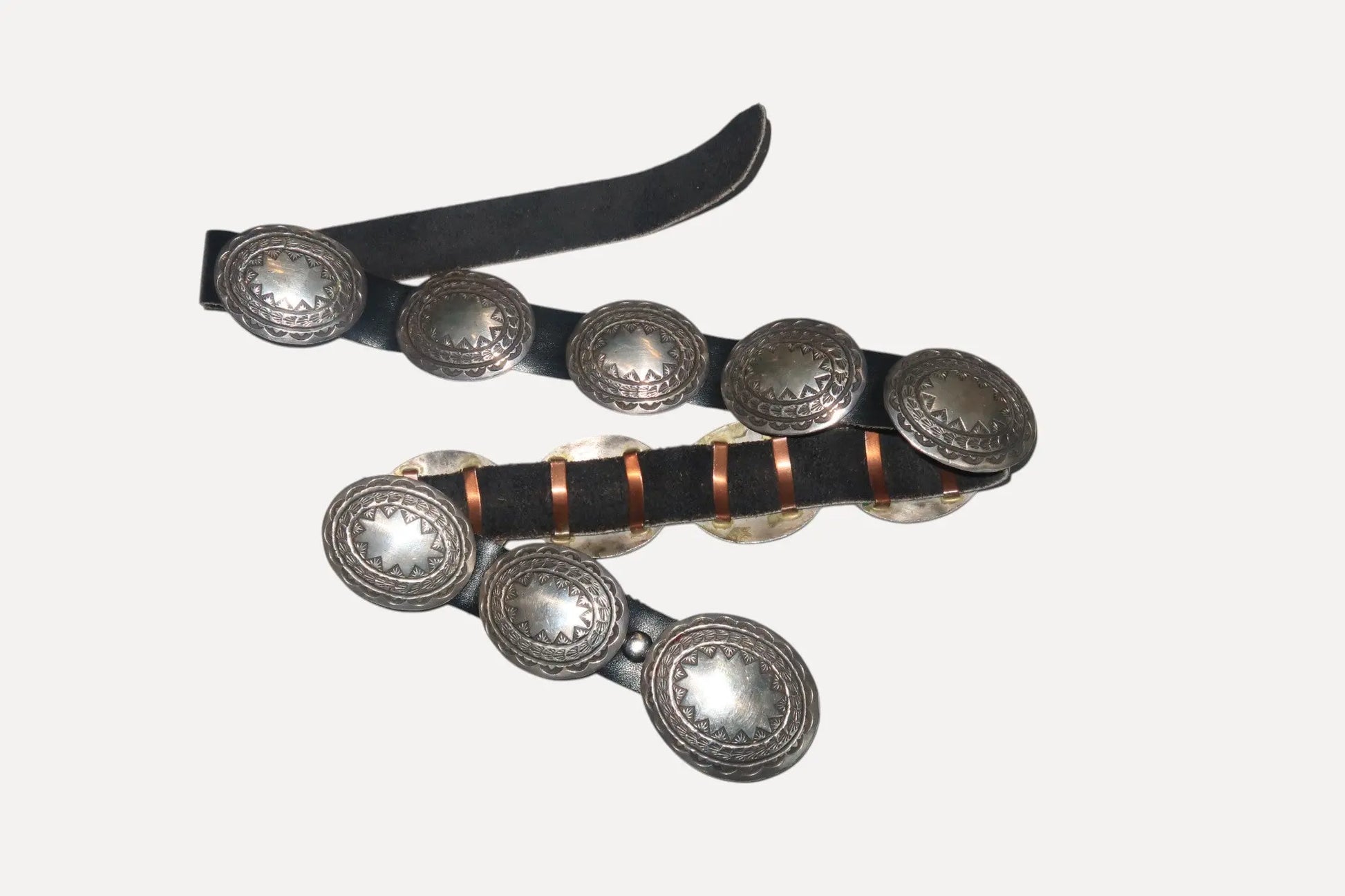 1980s Sterling Concho Belt, Navajo, Willie Mariano 1980s Sterling Concho Belt, Navajo, Willie Mariano Native American Collection Native American Collection  Squash Blossom Vail