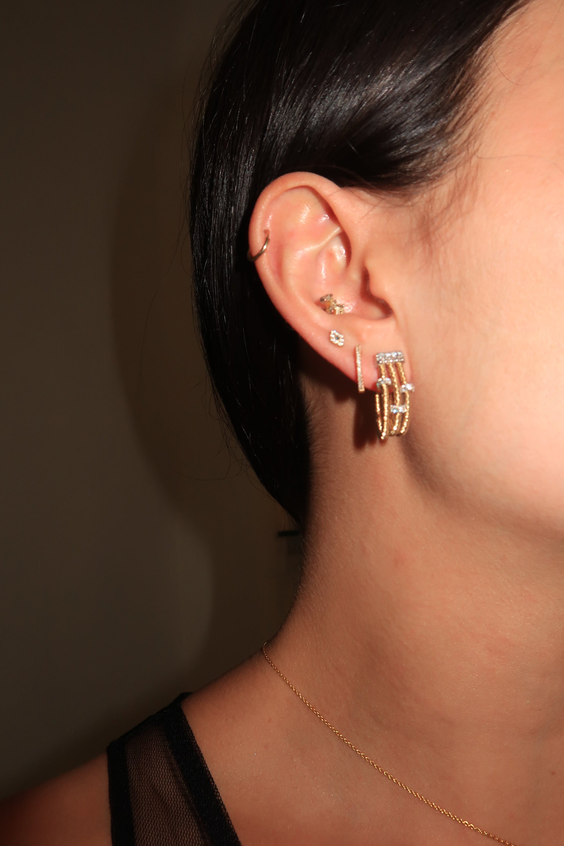 3 Strand Earrings with Diamond Stations 3 Strand Earrings with Diamond Stations Piero Milano Piero Milano  Squash Blossom Vail