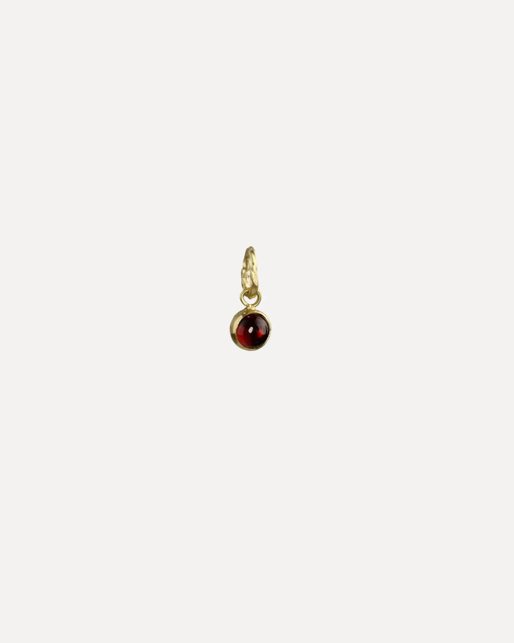 4mm Garnet pendant, bias bail 4mm Garnet pendant, bias bail Sarah McGuire Sarah McGuire  Squash Blossom Vail