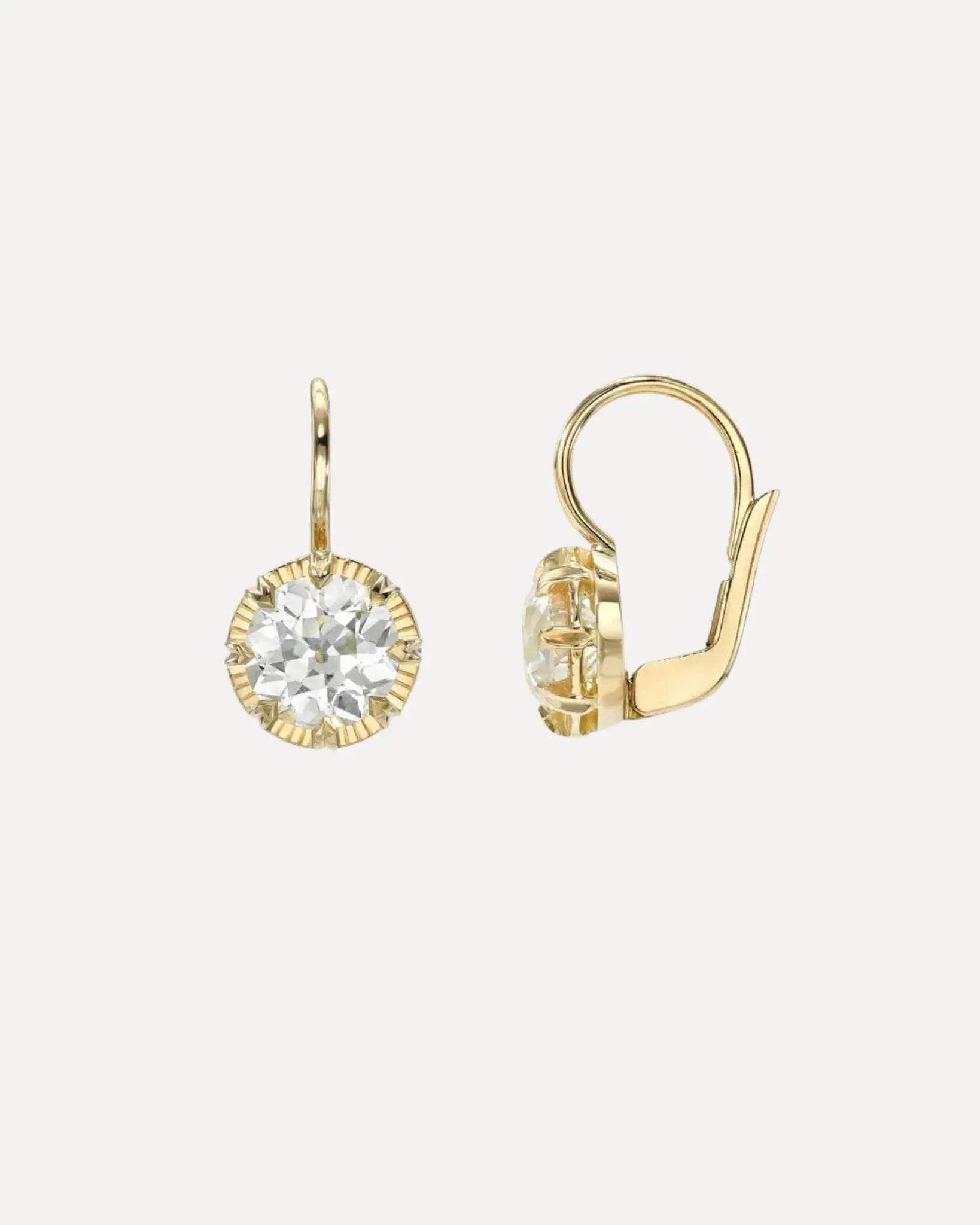 A pair of 18k yellow gold diamond drop earrings by Single Stone.