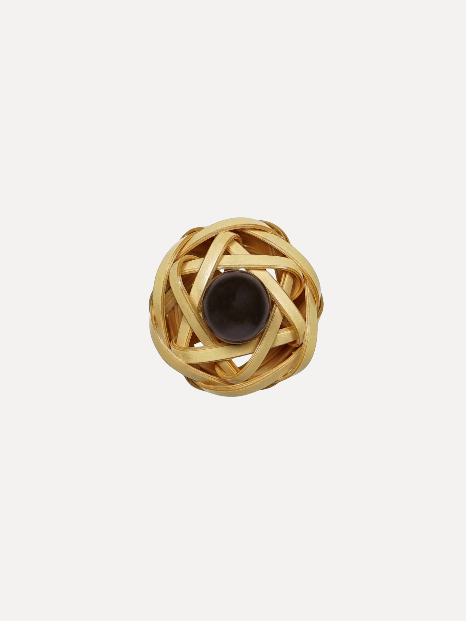 Gold ring with a central black pearl on a white background. Bamboo ring with black pearl ring