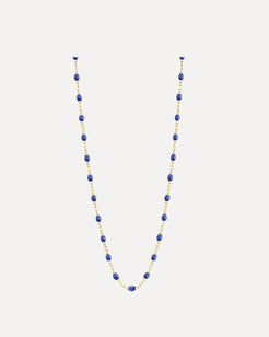 Necklace with blue beads on a white background
