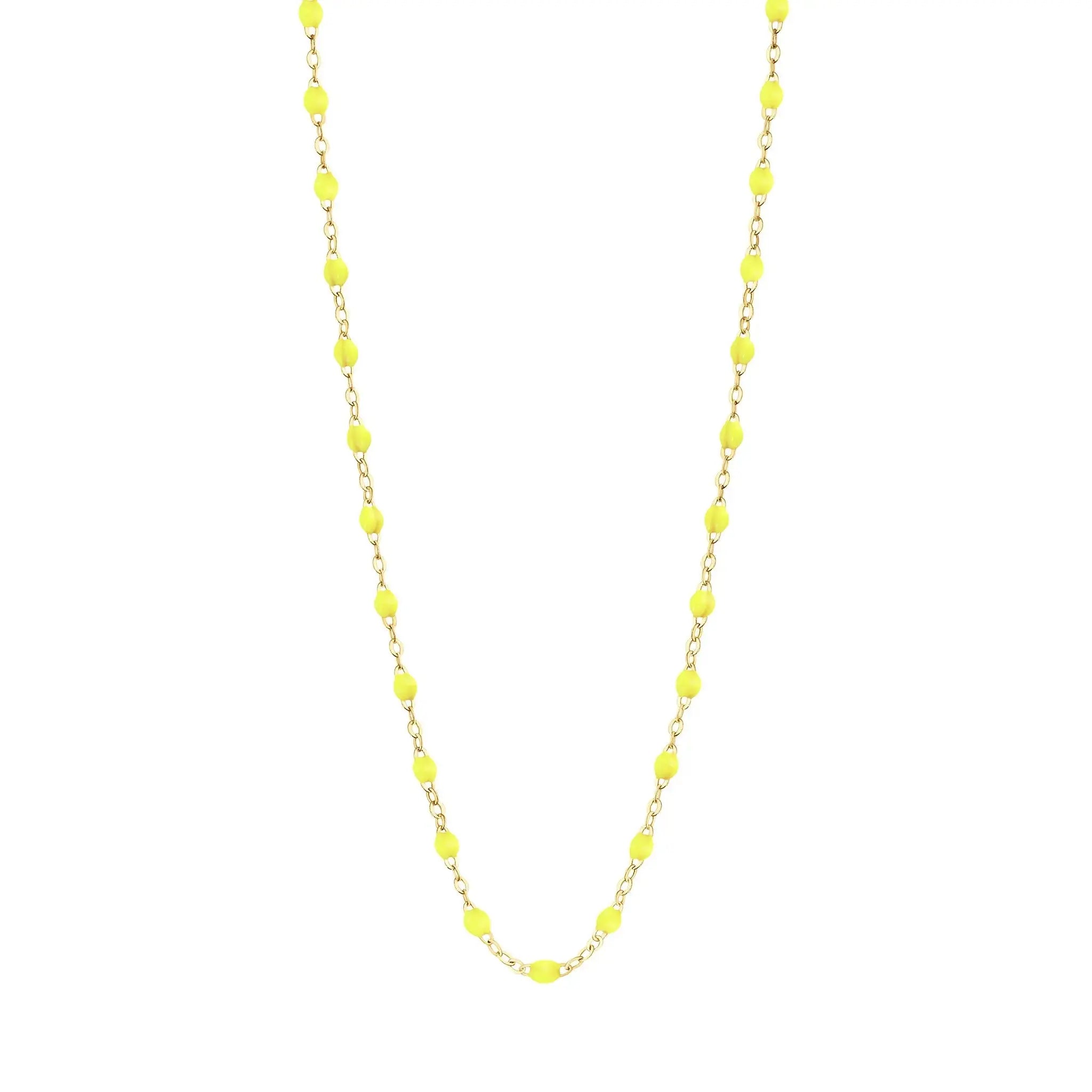 Stack you necklace layers with this versatile beaded chain! The Classic Gigi Necklace by gigi CLOZEAU features 18 carat yellow gold, and striking Baby Pink resin jewels for an everyday effortless appearance. Handcrafted in 18k yellow gold. The beads measure 1.50mm in diameter and is finished with a spring ring clasp. The length is 19.7 inches.