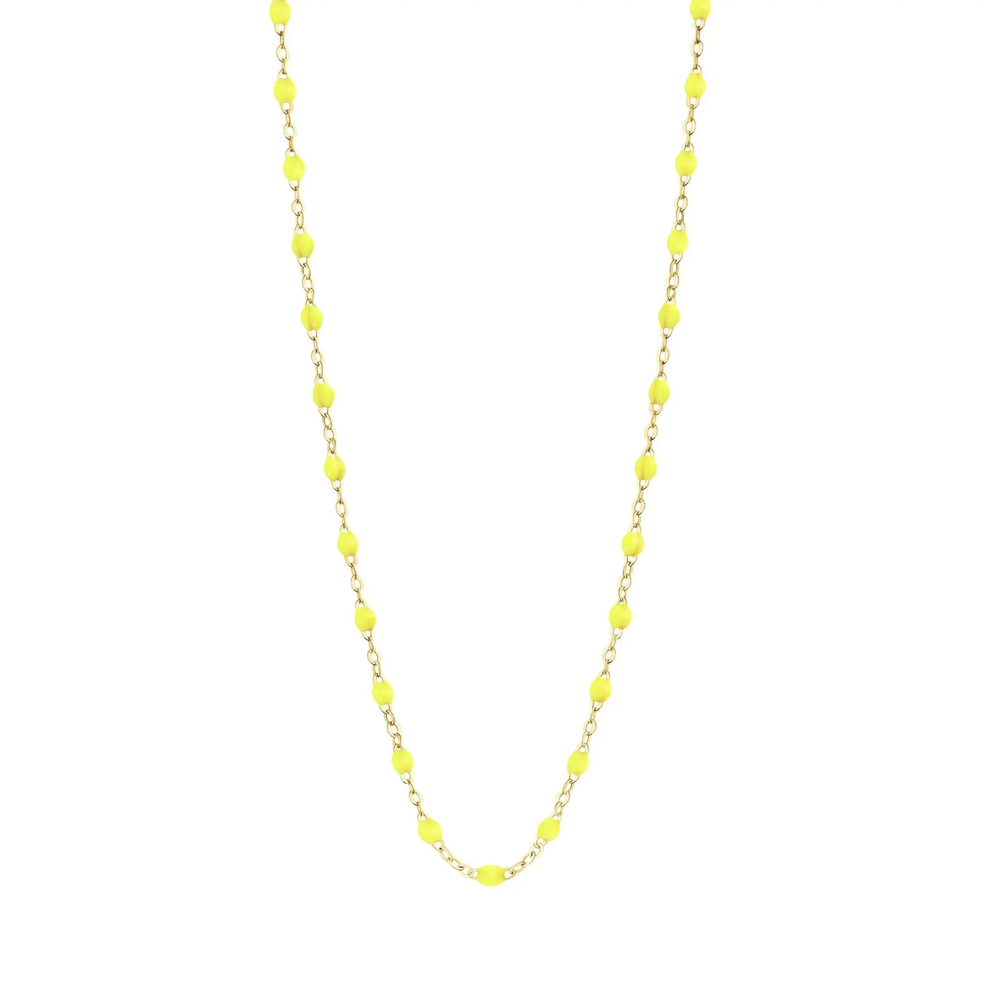 Stack you necklace layers with this versatile beaded chain! The Classic Gigi Necklace by gigi CLOZEAU features 18 carat yellow gold, and striking Baby Pink resin jewels for an everyday effortless appearance. Handcrafted in 18k yellow gold. The beads measure 1.50mm in diameter and is finished with a spring ring clasp. The length is 19.7 inches.