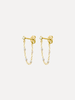 Gold chain earrings with small beads on a white background