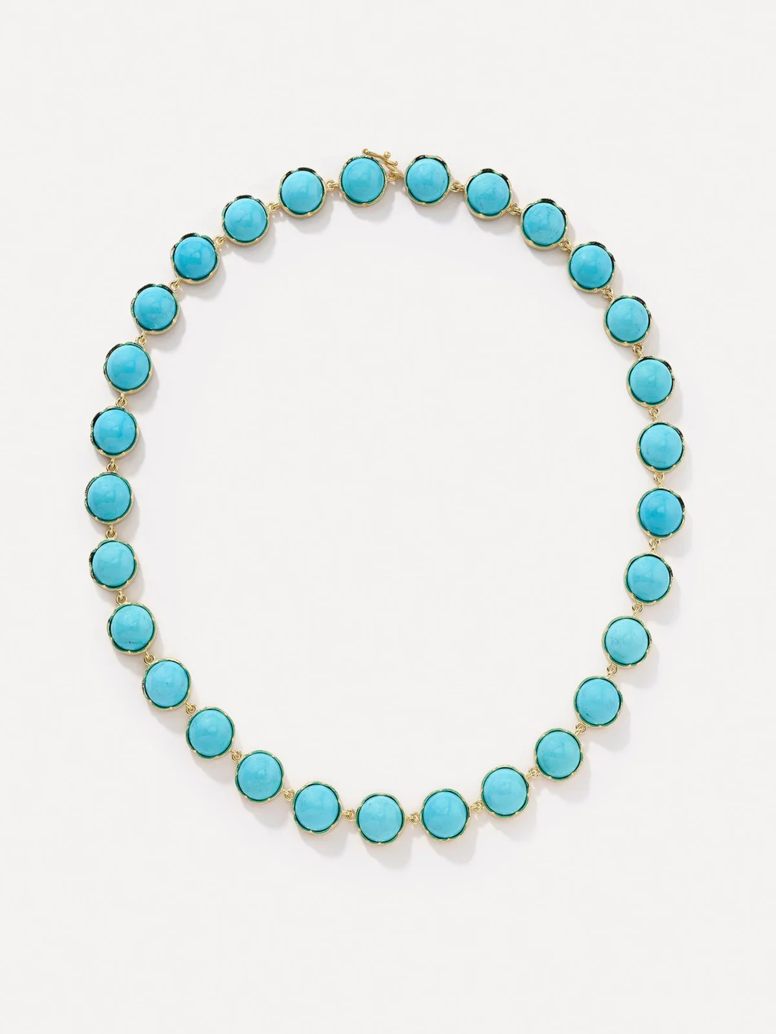 Turquoise necklace with gold accents on a white background. Classic Kingman Turquoise Necklace