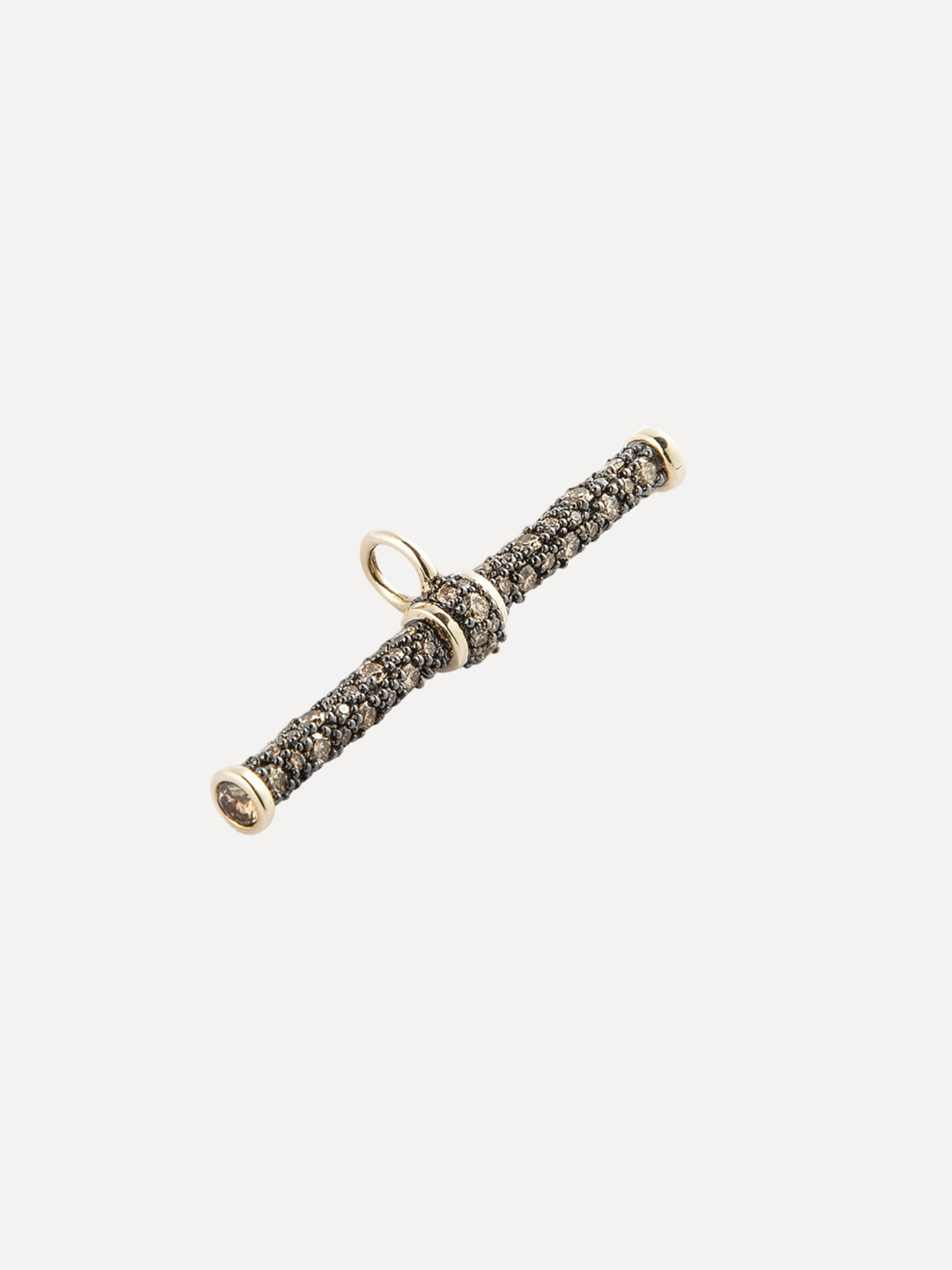 Gold and diamond-studded ring on a white background