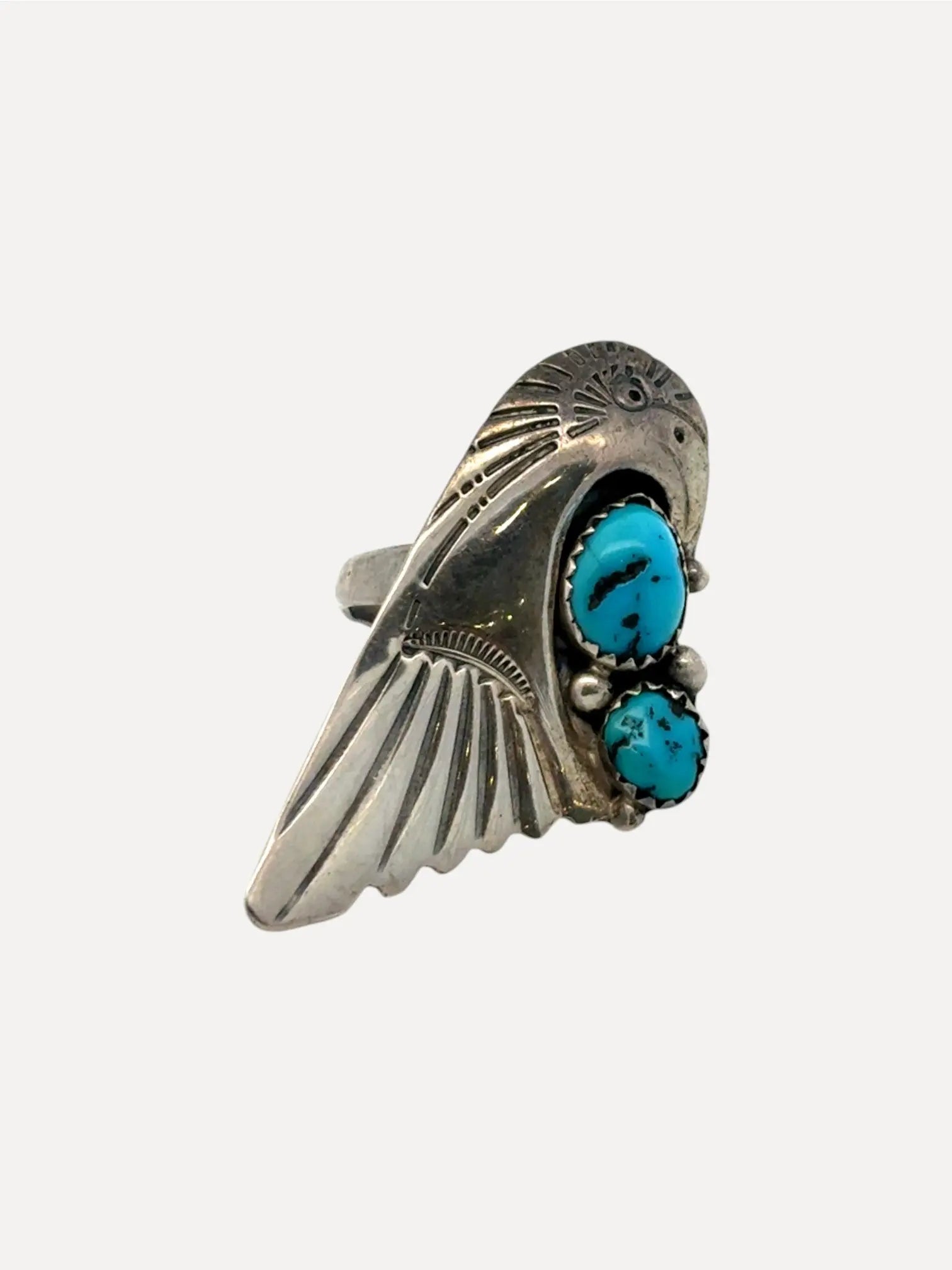 Eagle Head Ring w 2 Turquoise by Whirling Wing Eagle Head Ring w 2 Turquoise by Whirling Wing Native American Collection Native American Collection  Squash Blossom Vail