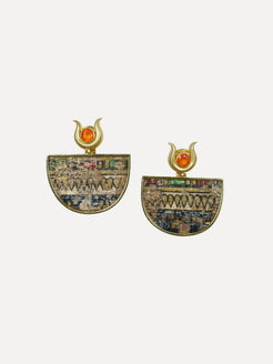 Pair of earrings with intricate designs and orange gemstones on a white background. Egypt Earrings