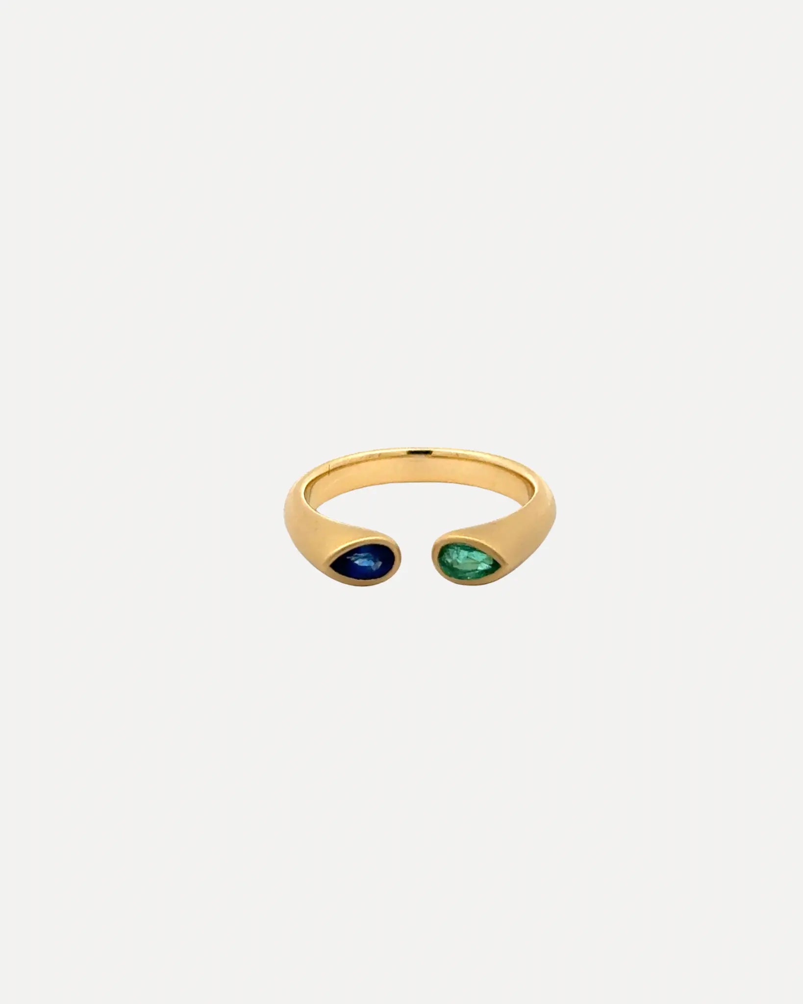 Emerald and Blue Sapphire Hug Ring Emerald and Blue Sapphire Hug Ring Squash Blossom Collection Squash Blossom Collection  Squash Blossom Vail