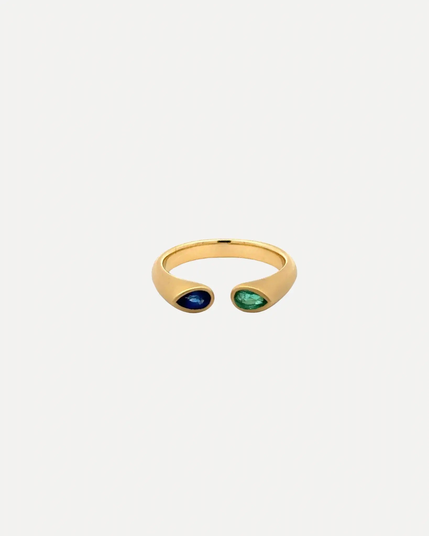 Emerald and Blue Sapphire Hug Ring Emerald and Blue Sapphire Hug Ring Squash Blossom Collection Squash Blossom Collection  Squash Blossom Vail