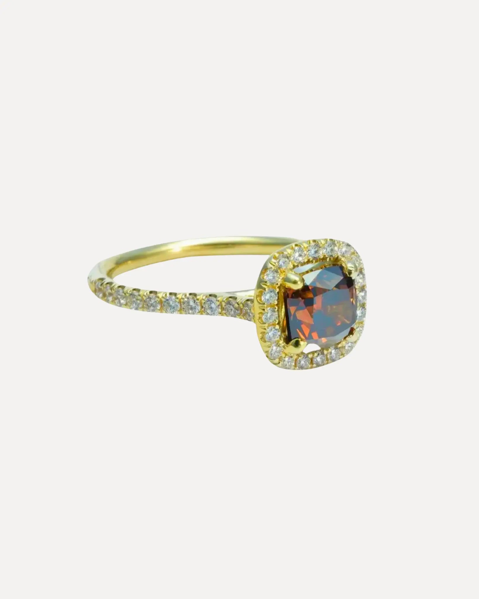 Fancy orange-brown cushion cut diamond ring Fancy orange-brown cushion cut diamond ring Vintage at the Squash Blossom Vintage at the Squash Blossom  Squash Blossom Vail