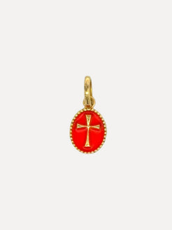 Gold pendant with red enamel on a white background