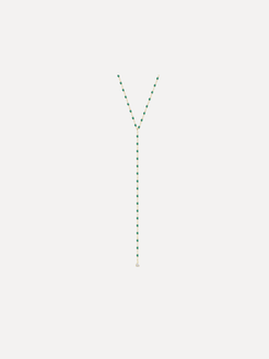 Green beaded necklace on a white background