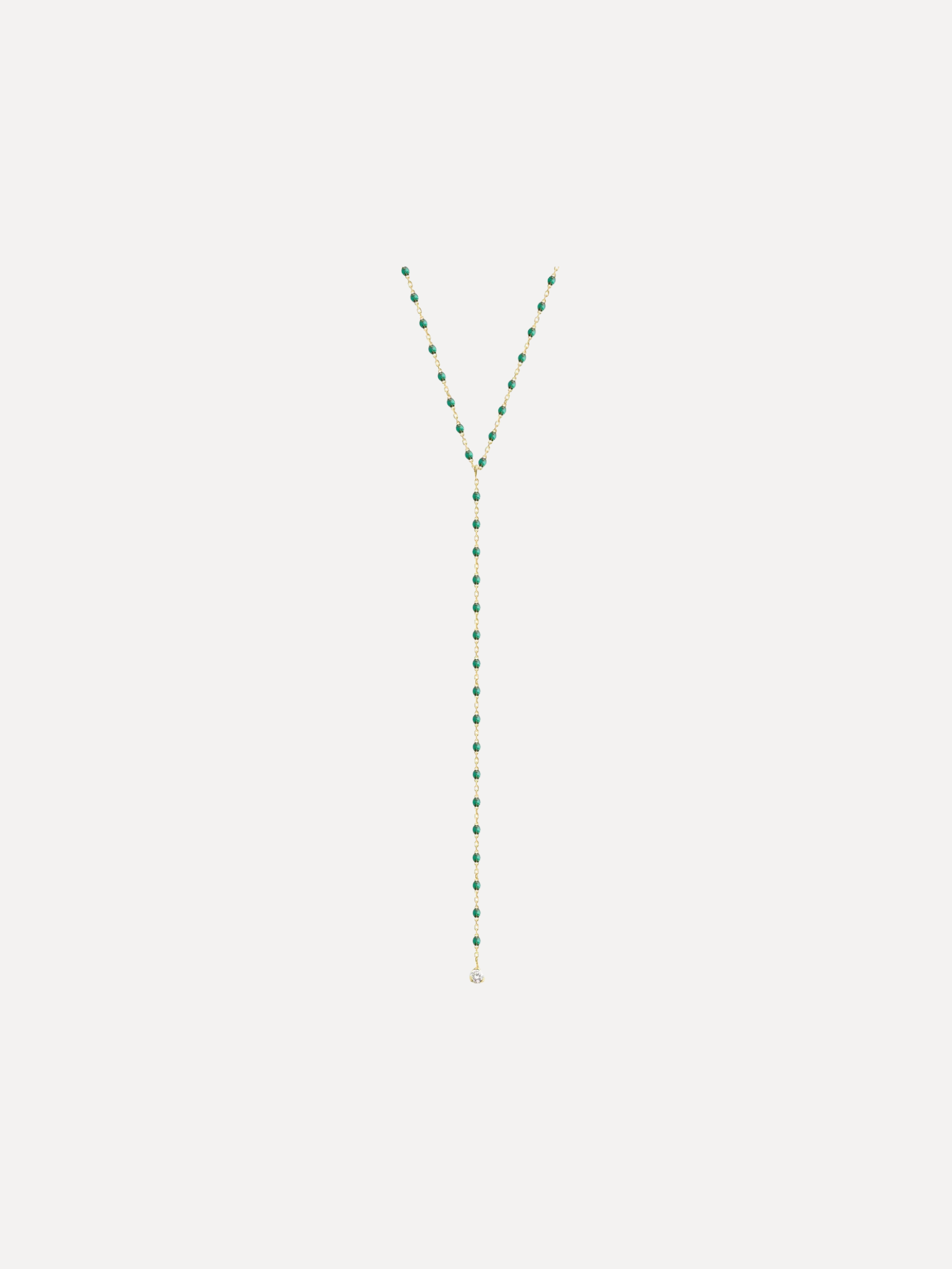 Necklace with green beads on a white background