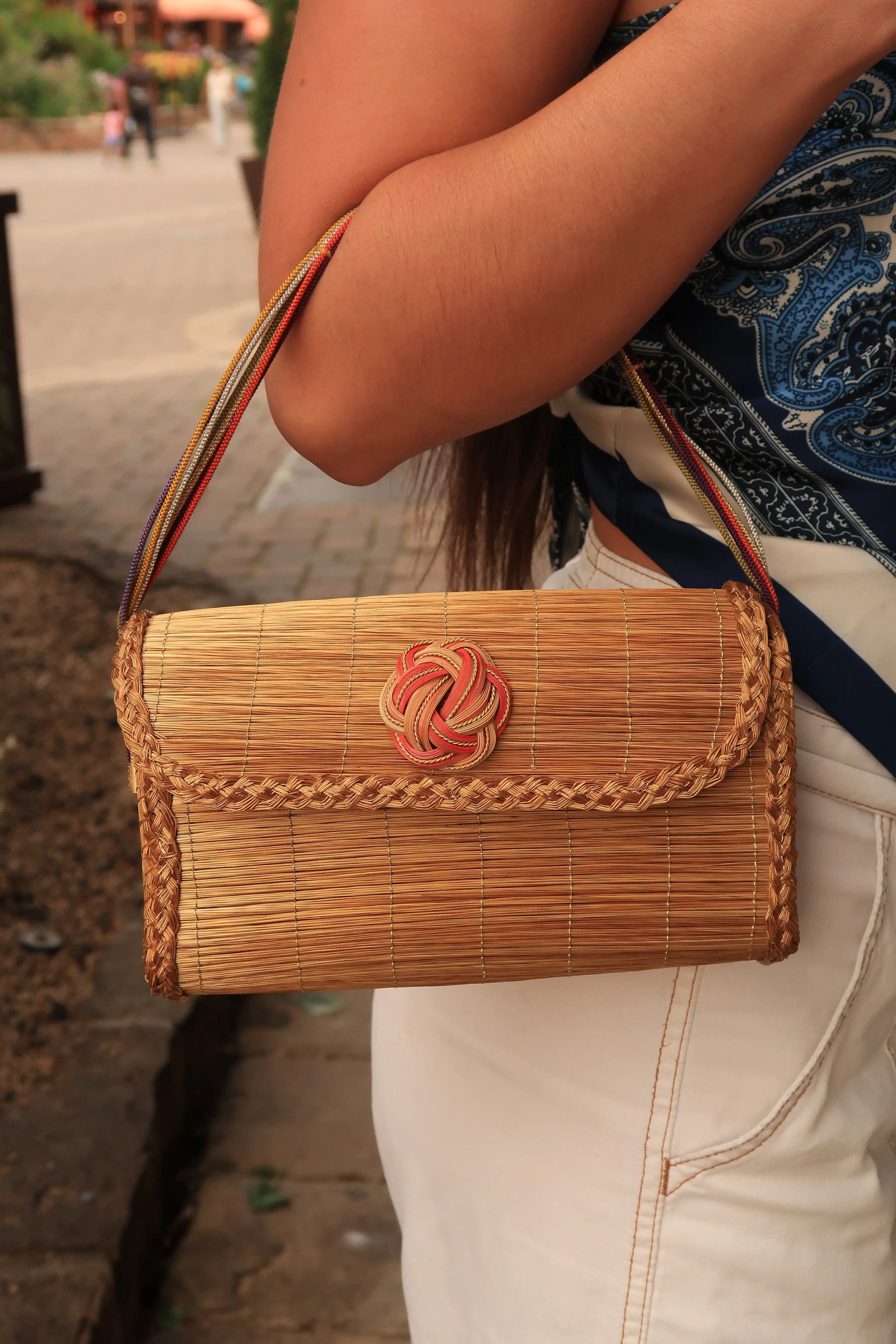 Golden grass braided bag with bamboo brooch and obi fabric Golden grass braided bag with bamboo brooch and obi fabric Silvia Furmanovich Silvia Furmanovich  Squash Blossom Vail