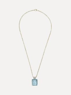 An aquamarine & diamond pendant on a gold chain by Irene Neuwirth.