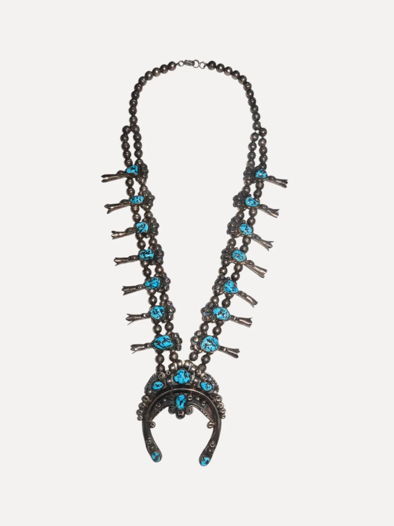 Jimmie Long Squash Blossom Necklace, c.1970 Jimmie Long Squash Blossom Necklace, c.1970 Nancy Huerta Nancy Huerta  Squash Blossom Vail