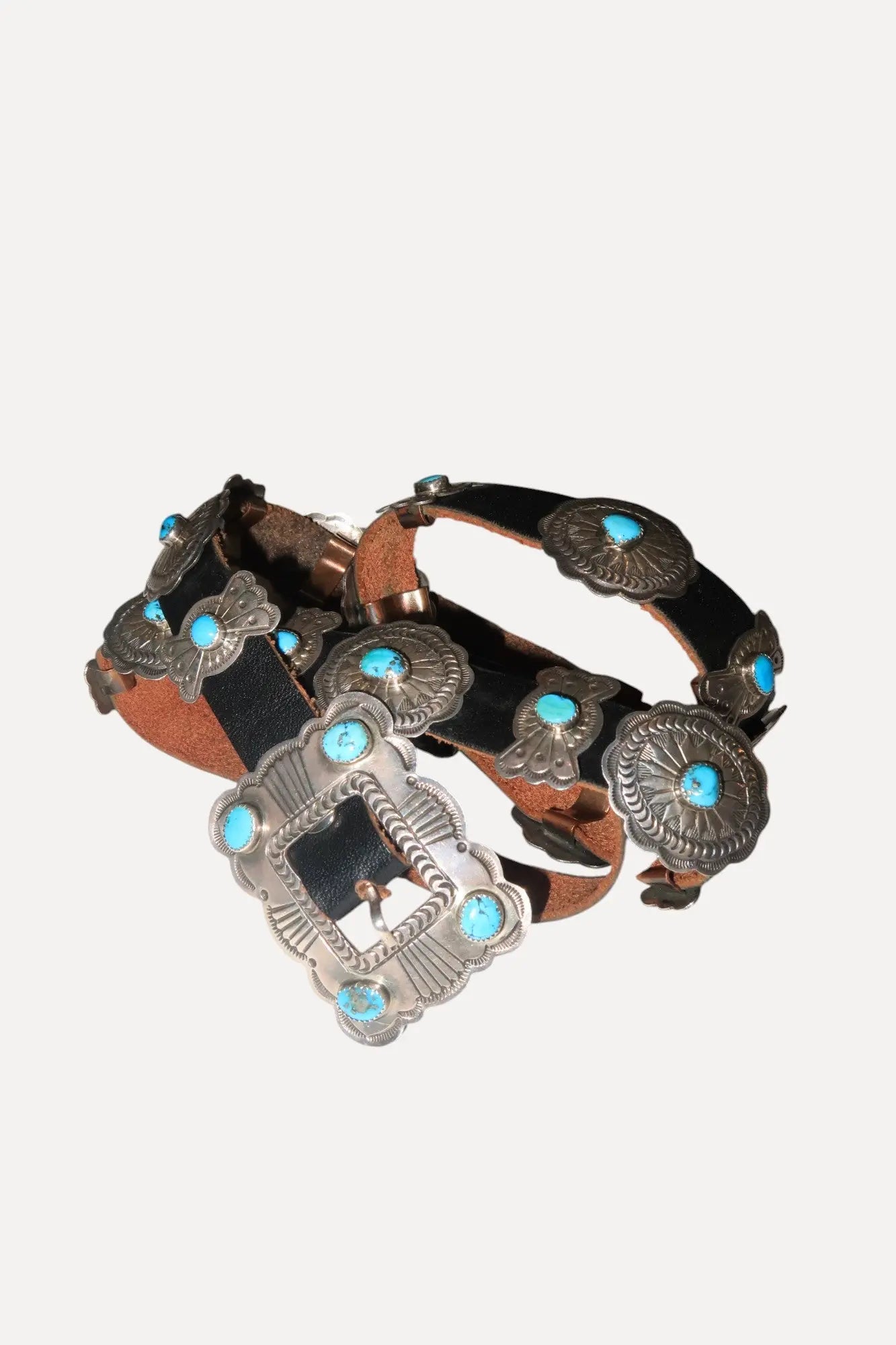 Ladies Concho Belt by John Delvin, Navajo, c.1980 Ladies Concho Belt by John Delvin, Navajo, c.1980 Stephen's Stephen's  Squash Blossom Vail
