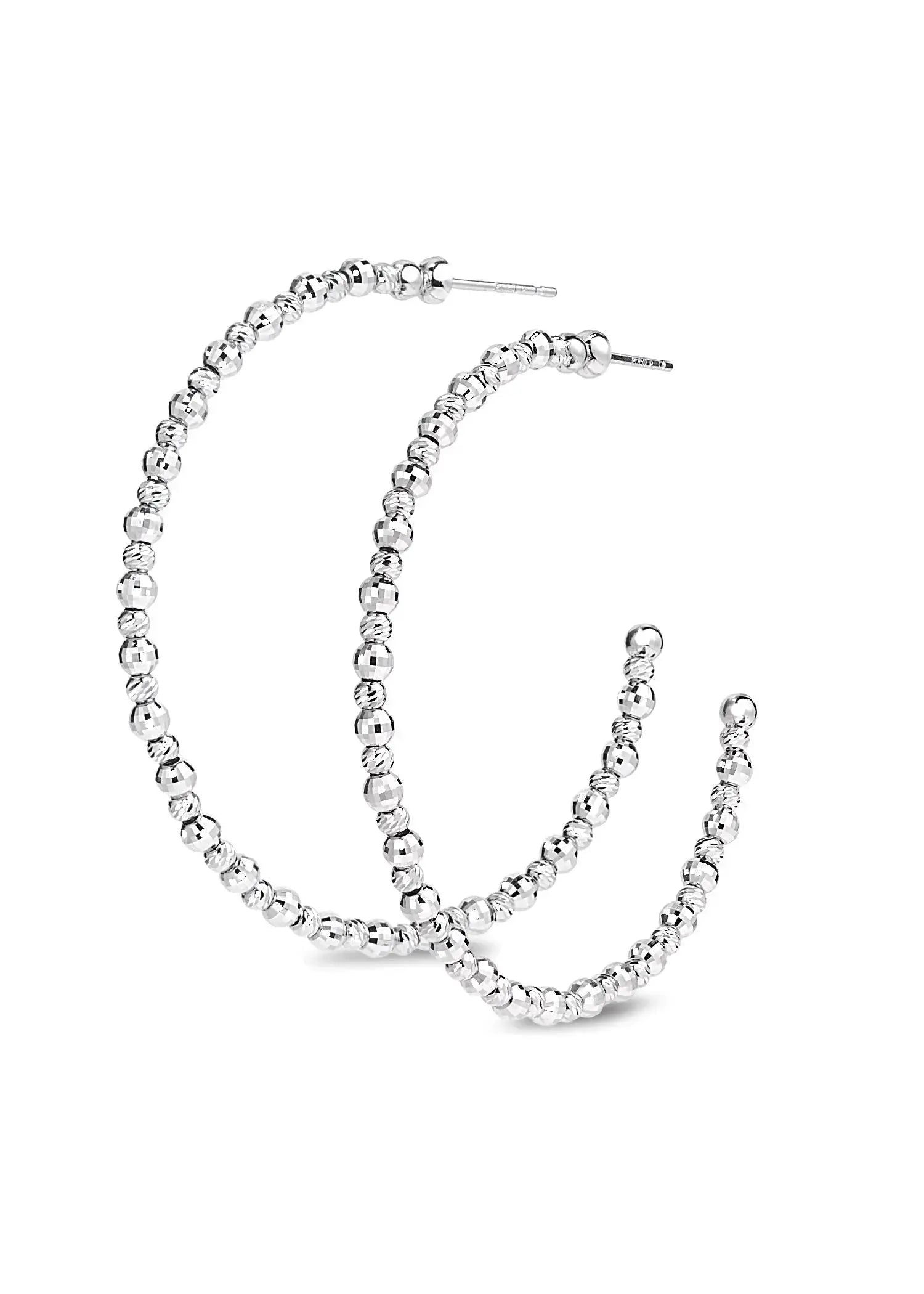 Luminous platinum beads catch the light like diamonds in a sculptural hoop shape.  Product Details:  Platinum Post and Silicone Catch Size (1.57 Inch Diameter)  Designed by Platinum Born