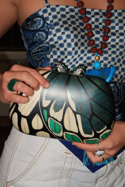 Marquetry clutch with diamond and butterfly pattern Marquetry clutch with diamond and butterfly pattern Silvia Furmanovich Silvia Furmanovich  Squash Blossom Vail