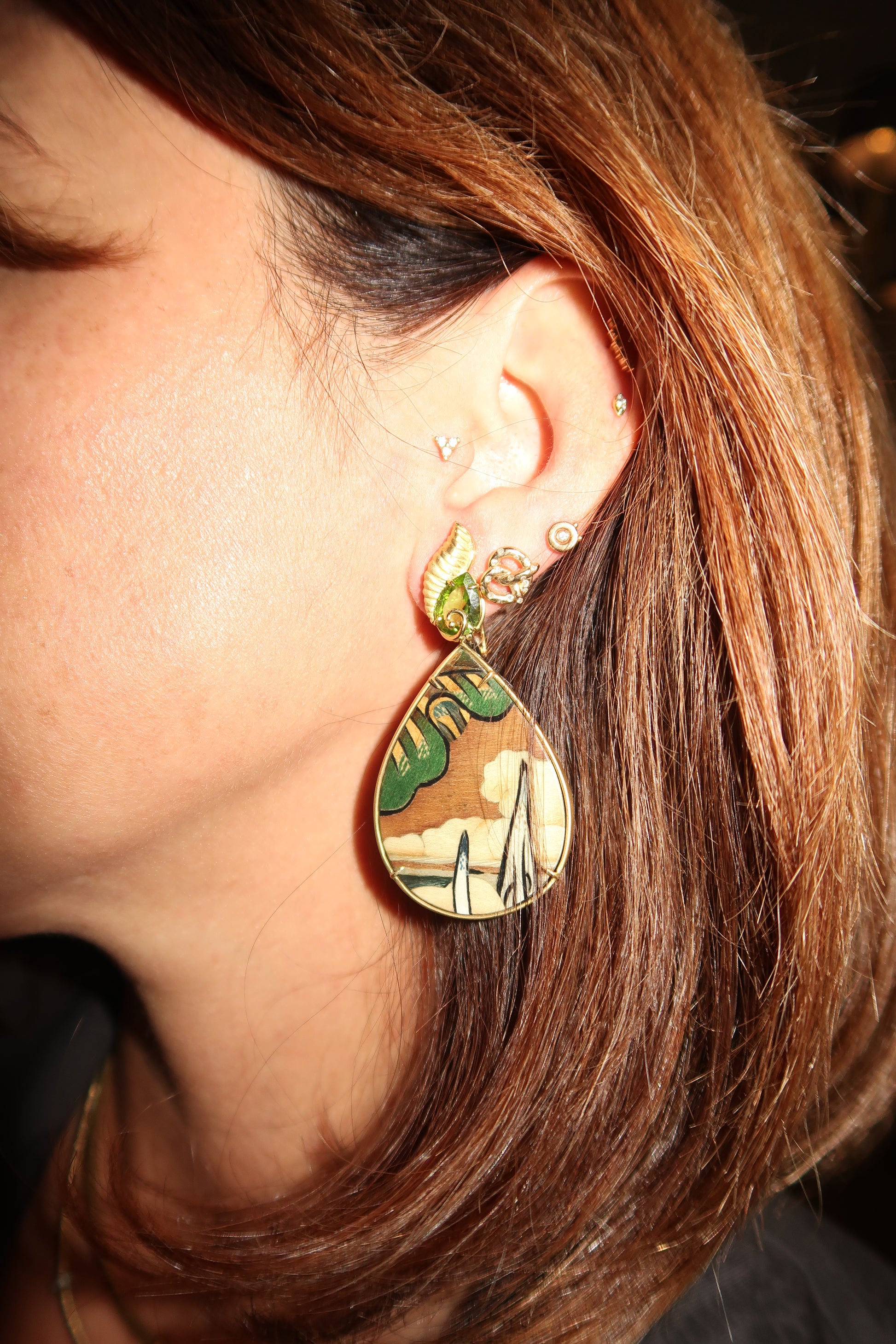 Marquetry earrings with drop format, Tibetan forest print, diamond and peridot earrings Marquetry earrings with drop format, Tibetan forest print, diamond and peridot earrings Silvia Furmanovich Silvia Furmanovich  Squash Blossom Vail