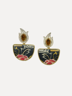 Pair of earrings with floral design on a white background. Marquetry earrings with halfmoon format