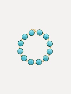 A gold-plated bracelet featuring round turquoise-blue cabochon gemstones, arranged in a circular shape against a light gray background.