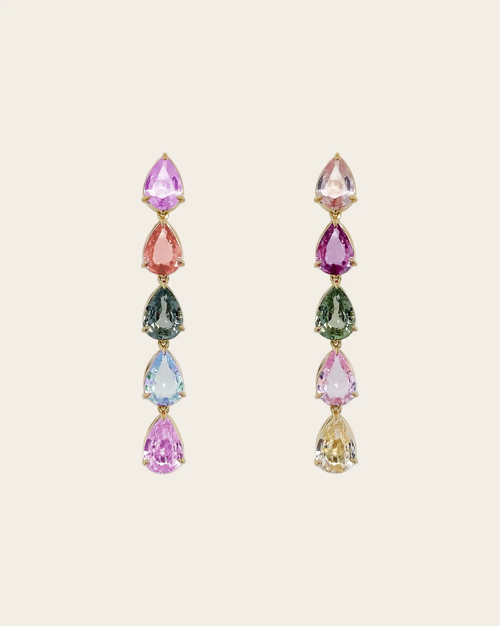 A pair of Bayco multi colored sapphire dangle earrings.