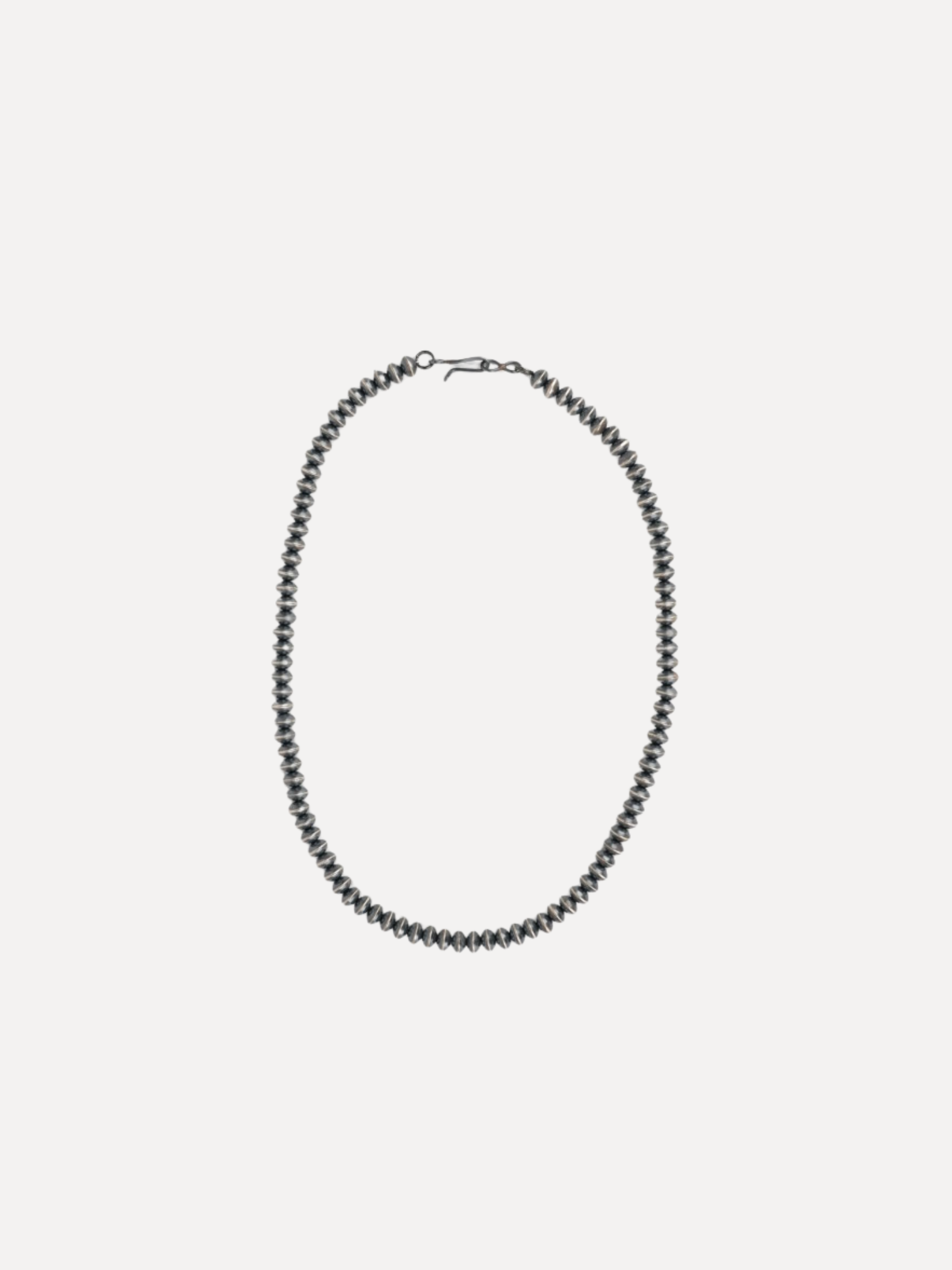 A dark gunmetal beaded chain necklace with a lobster clasp, displayed on a light gray background.