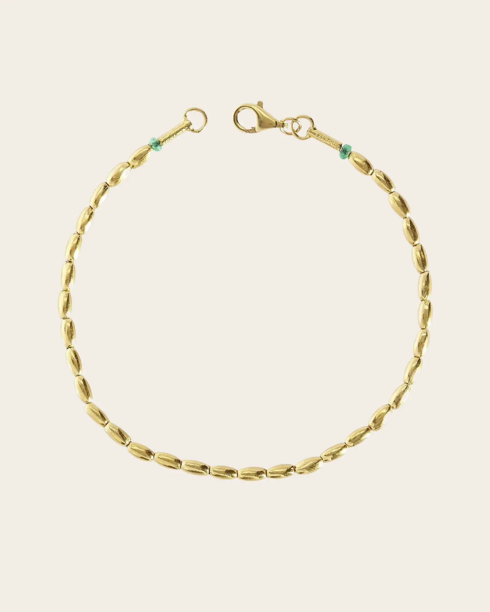 Olive Gold Bracelet, Single Strand with Emerald Olive Gold Bracelet, Single Strand with Emerald Gurhan Gurhan  Squash Blossom Vail