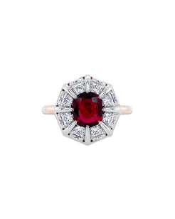 From Bayco's Collection, this beautiful Ruby Ring. A  platinum and 18k rose gold ring centered upon a cushion Thai ruby set atop a domed cluster of colorless diamonds. The ruby is 1.11 cttws and the brilliant white diamonds are 1.01 cttw. 