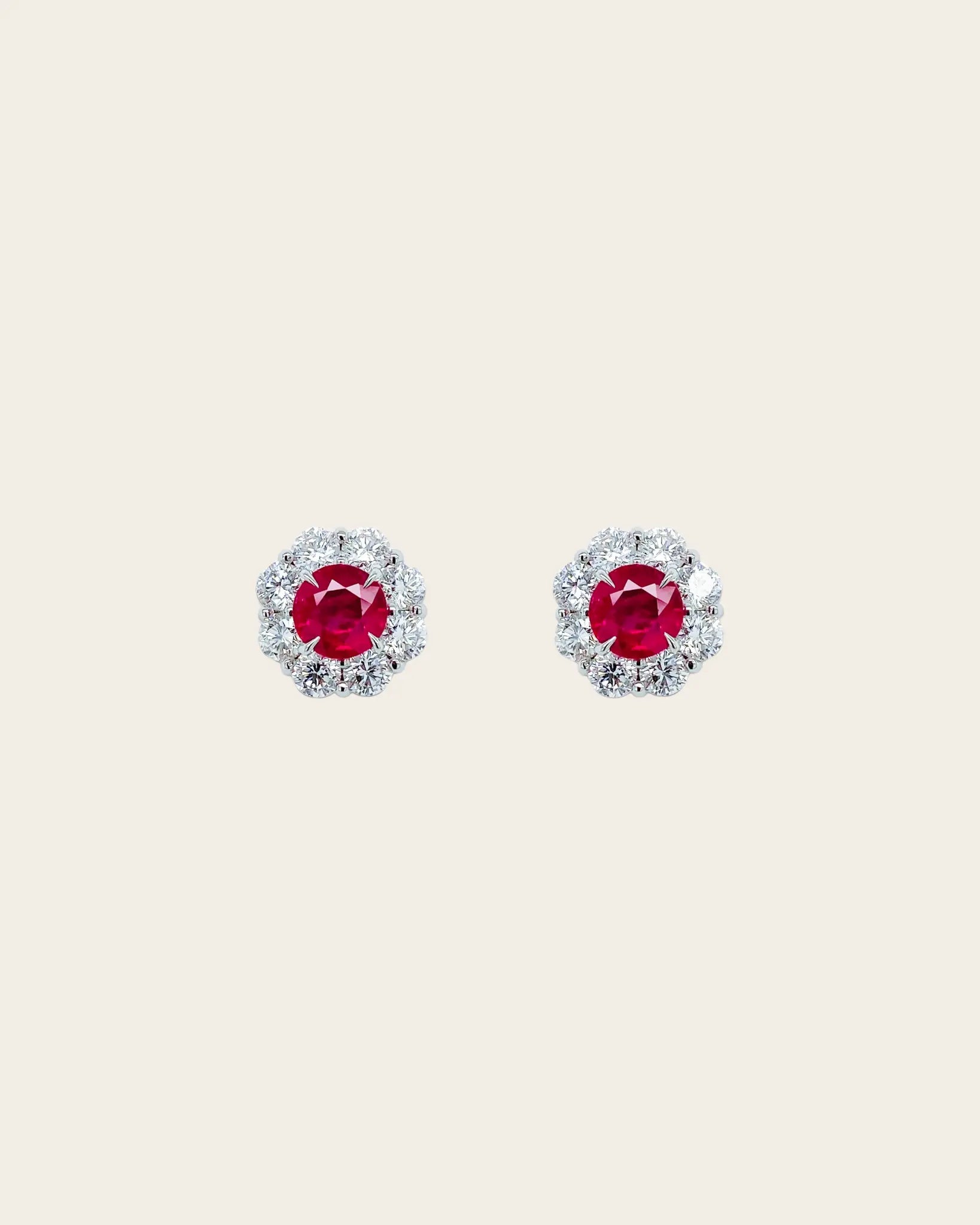 A pair of Bayco ruby and diamond stud earrings