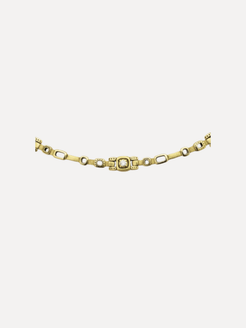 Alex Sepkus A gold-toned chain bracelet featuring a central rectangular link with a textured, diamond-like pattern, flanked by alternating elongated oval links and smaller round links, shown against a plain light gray background.