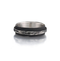 Pebble Raised Center Band in cobalt chrome 6.25mmPebble Raised Center Band in cobalt chrome 6.25mm  Ring Size: 10  If you need a different size, please email shop@sbvail.com  Designed by Sarah Graham Metalsmith