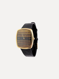 A Piaget tigers eye watch by Squash Blossom