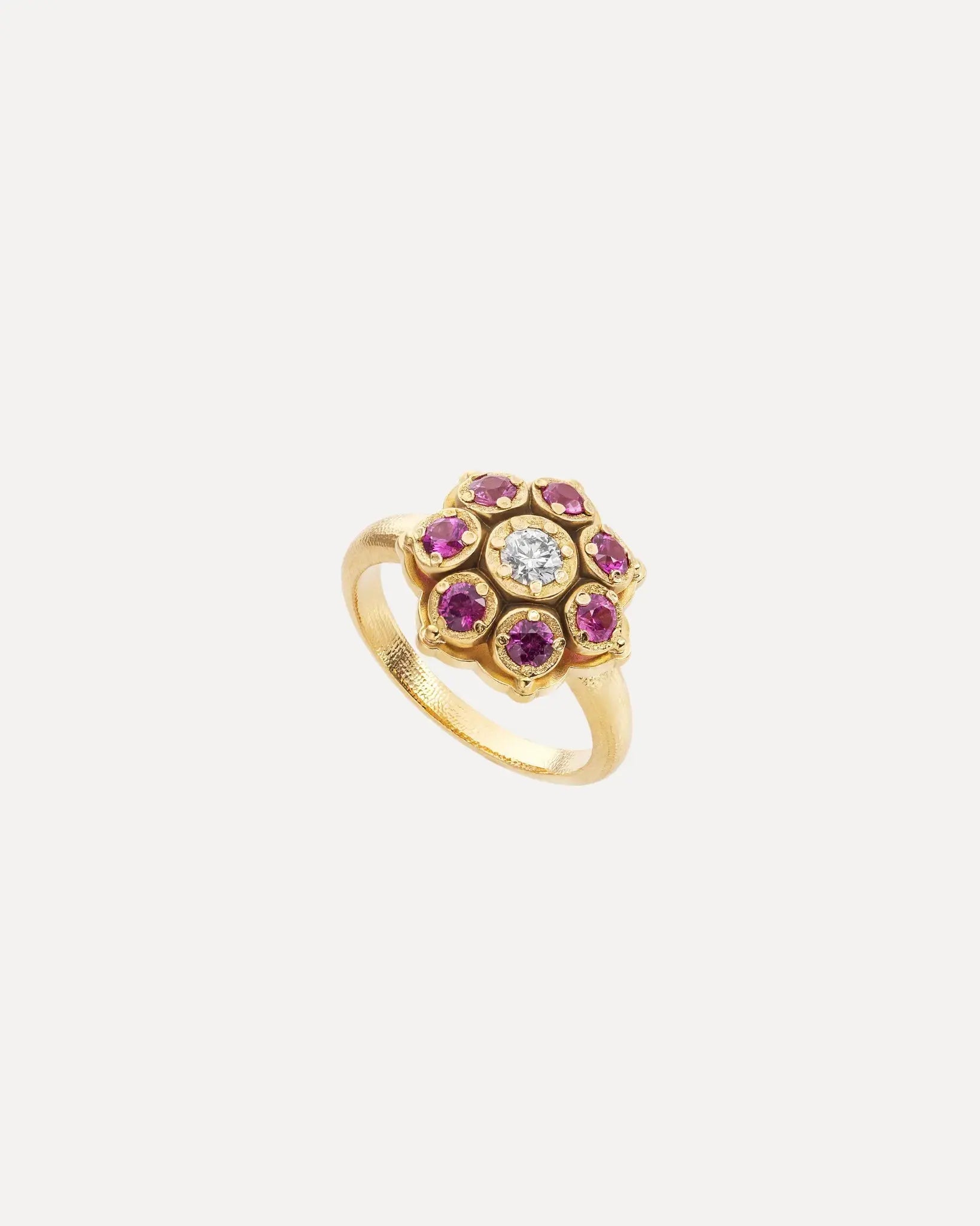 An 18k yellow gold pink sapphire and diamond flower ring by Alex Sepkus