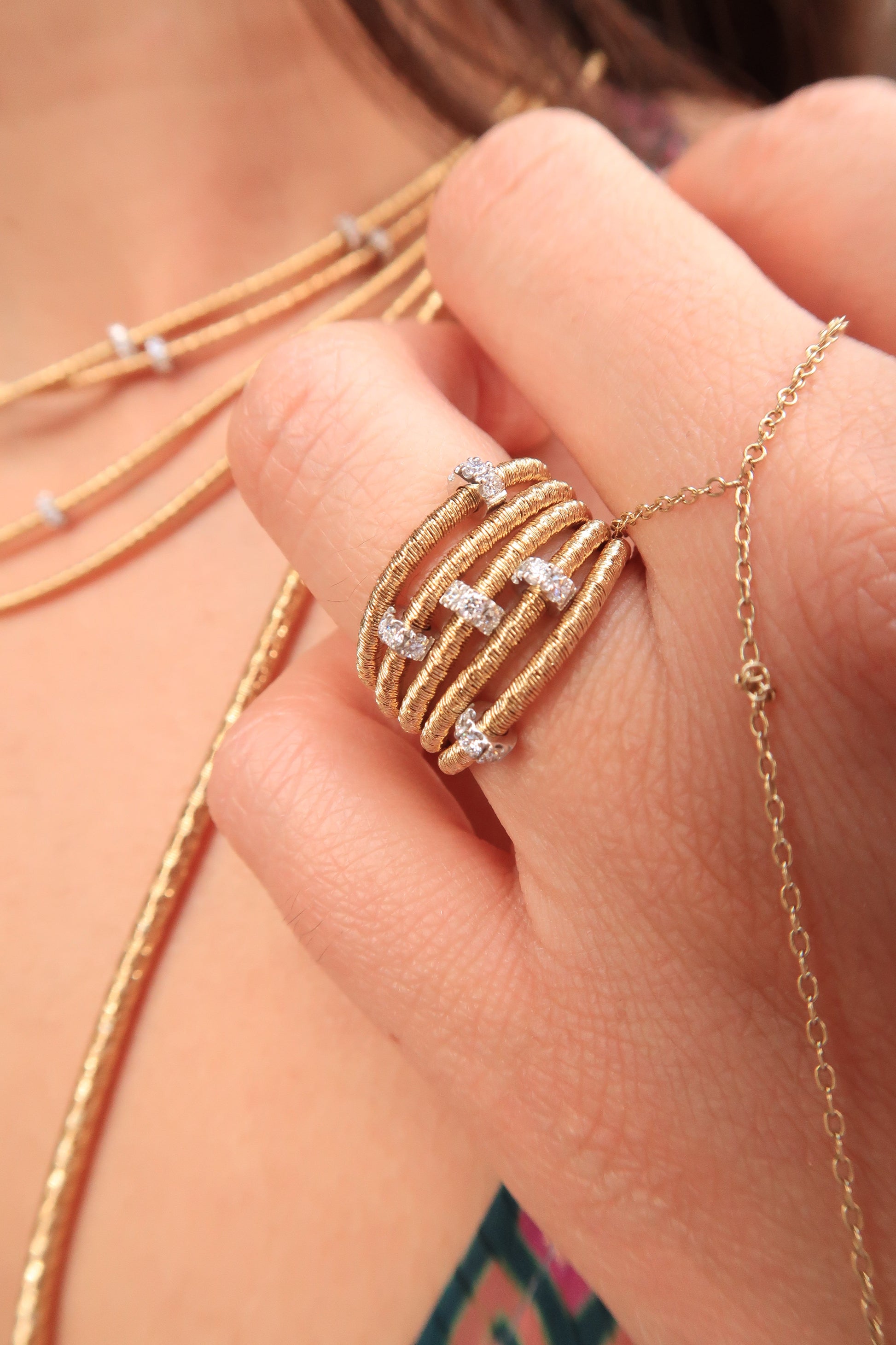 Ring with 5 Strands and Diamond Rondelles Ring with 5 Strands and Diamond Rondelles Piero Milano Piero Milano  Squash Blossom Vail