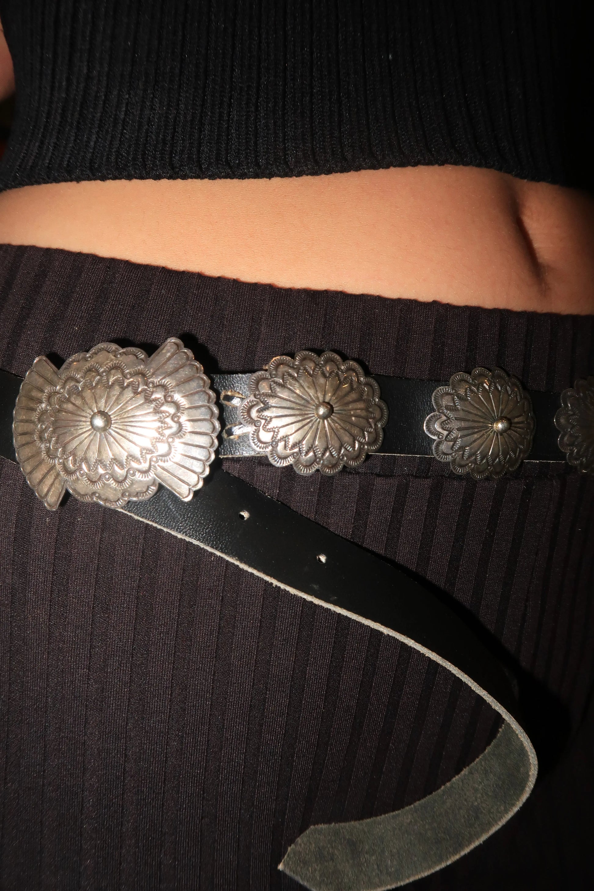 Silver Concho belt on leather. Stamped IL Silver Concho belt on leather. Stamped IL Native American Collection Native American Collection  Squash Blossom Vail