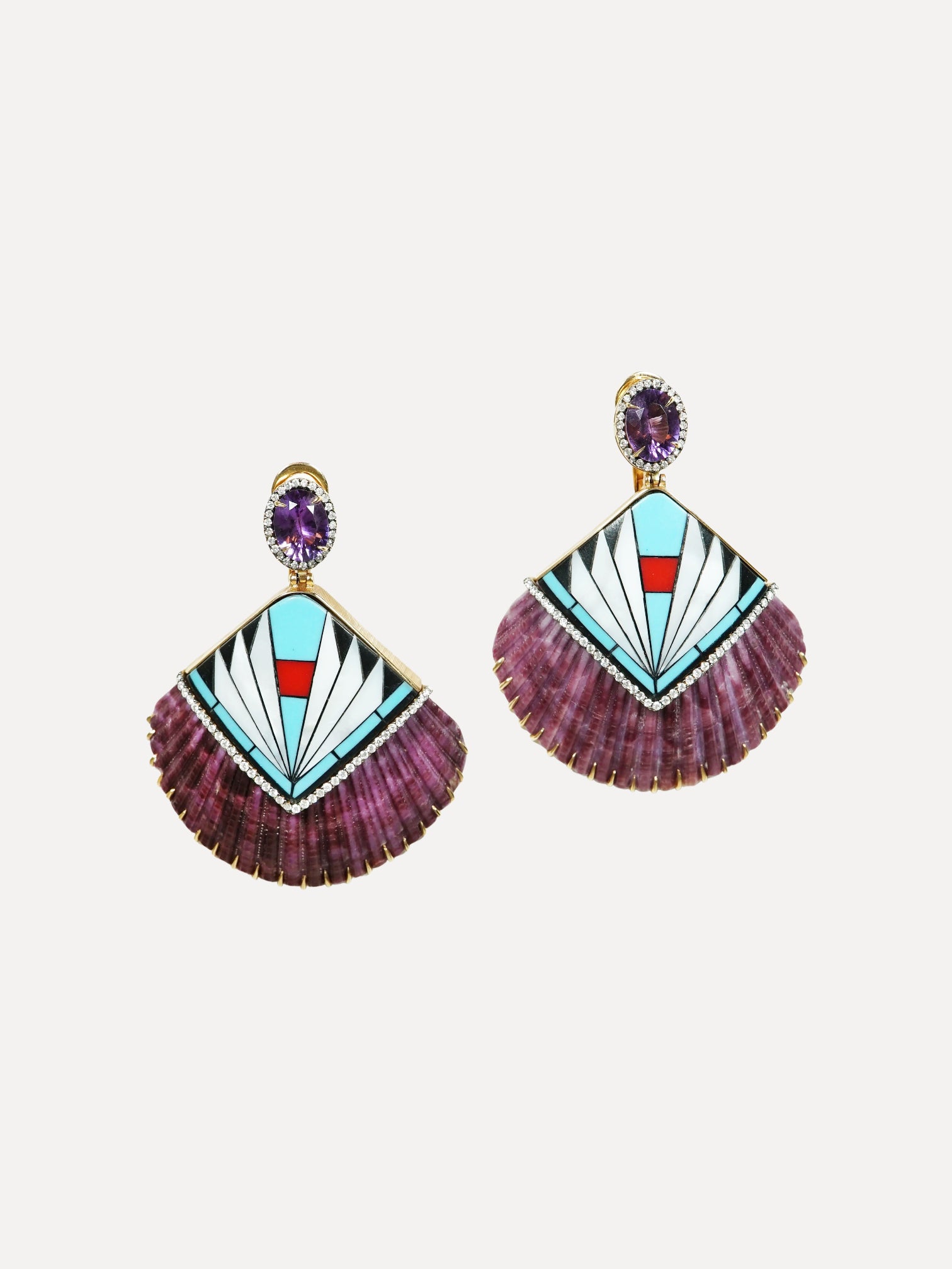 Colorful geometric earrings on a light gray background