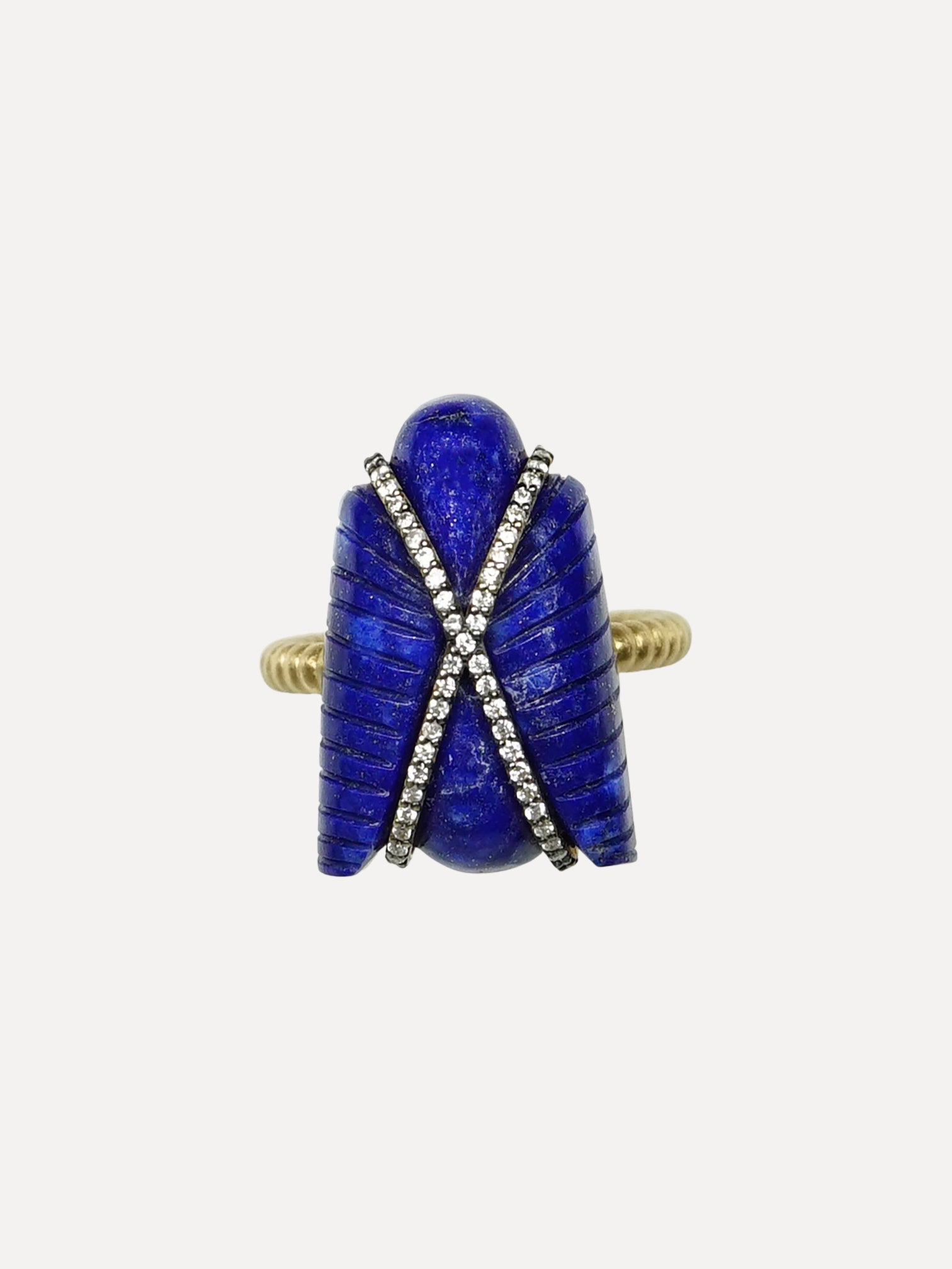 Blue stone ring with gold and silver accents on a white background. Silvia Furmonavich Egypt Fly Ring