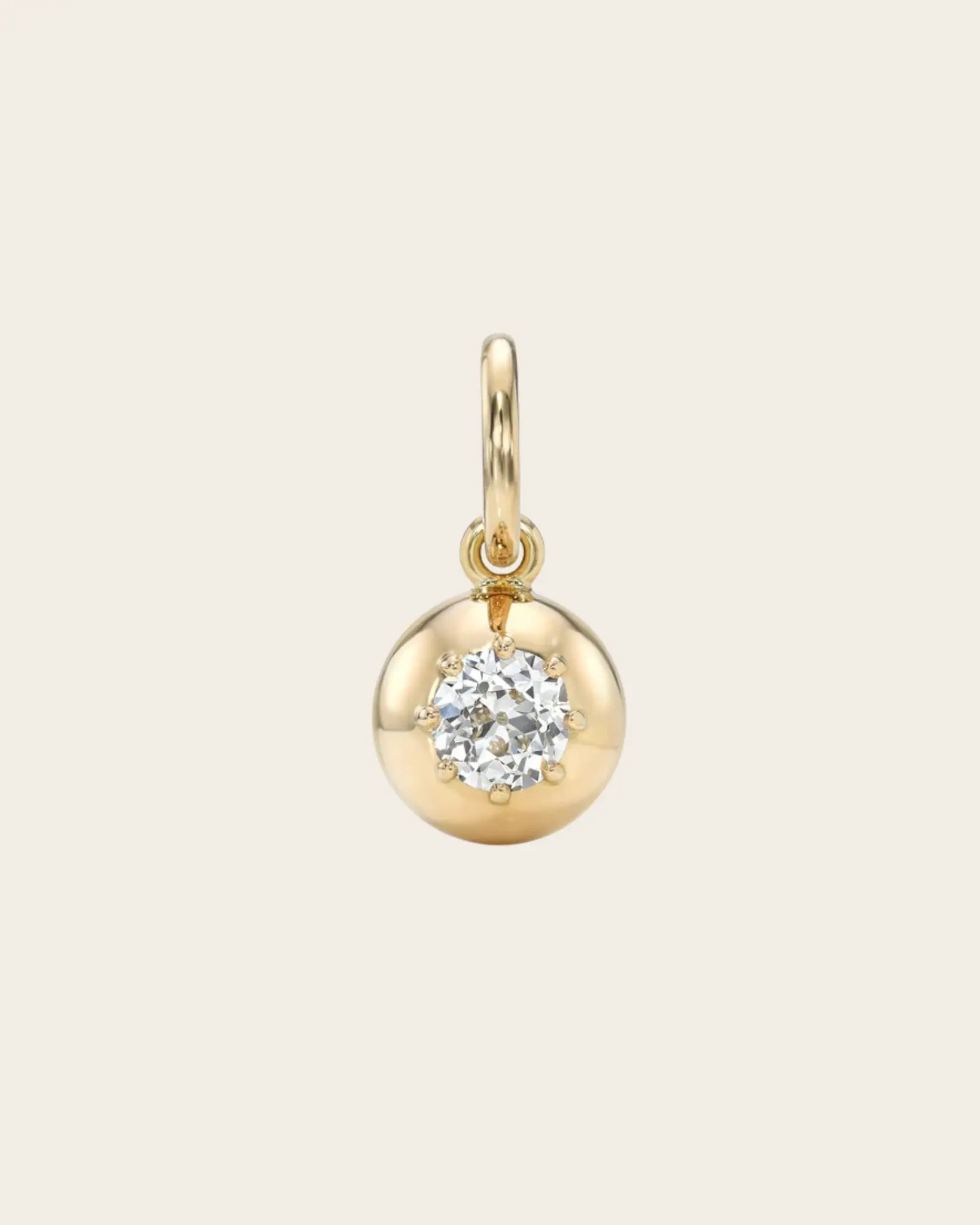 A gold and diamond pendant by Single Stone