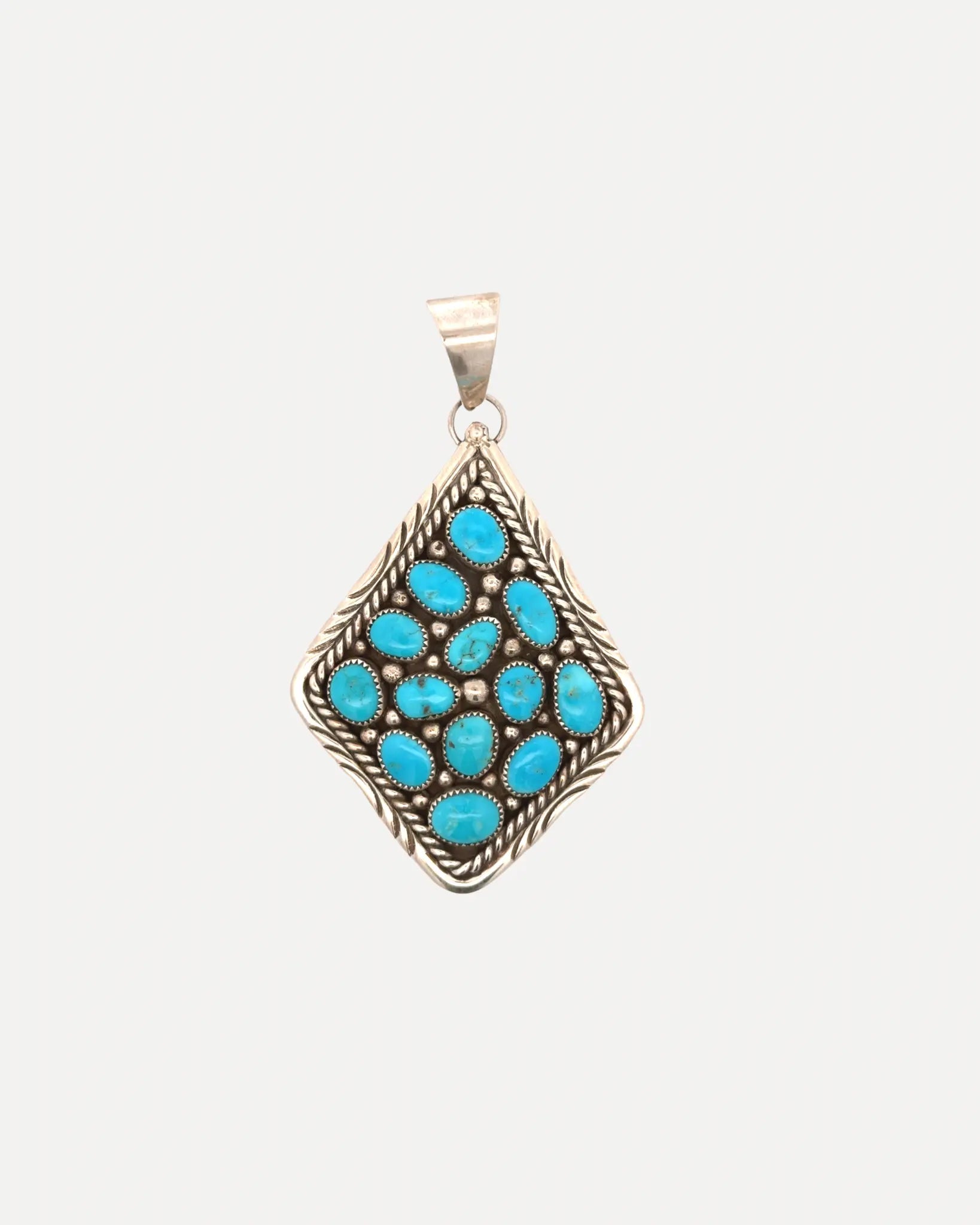 Sleeping Beauty Turquoise Kite-Shaped Pendant Sleeping Beauty Turquoise Kite-Shaped Pendant Native American Collection Native American Collection  Squash Blossom Vail