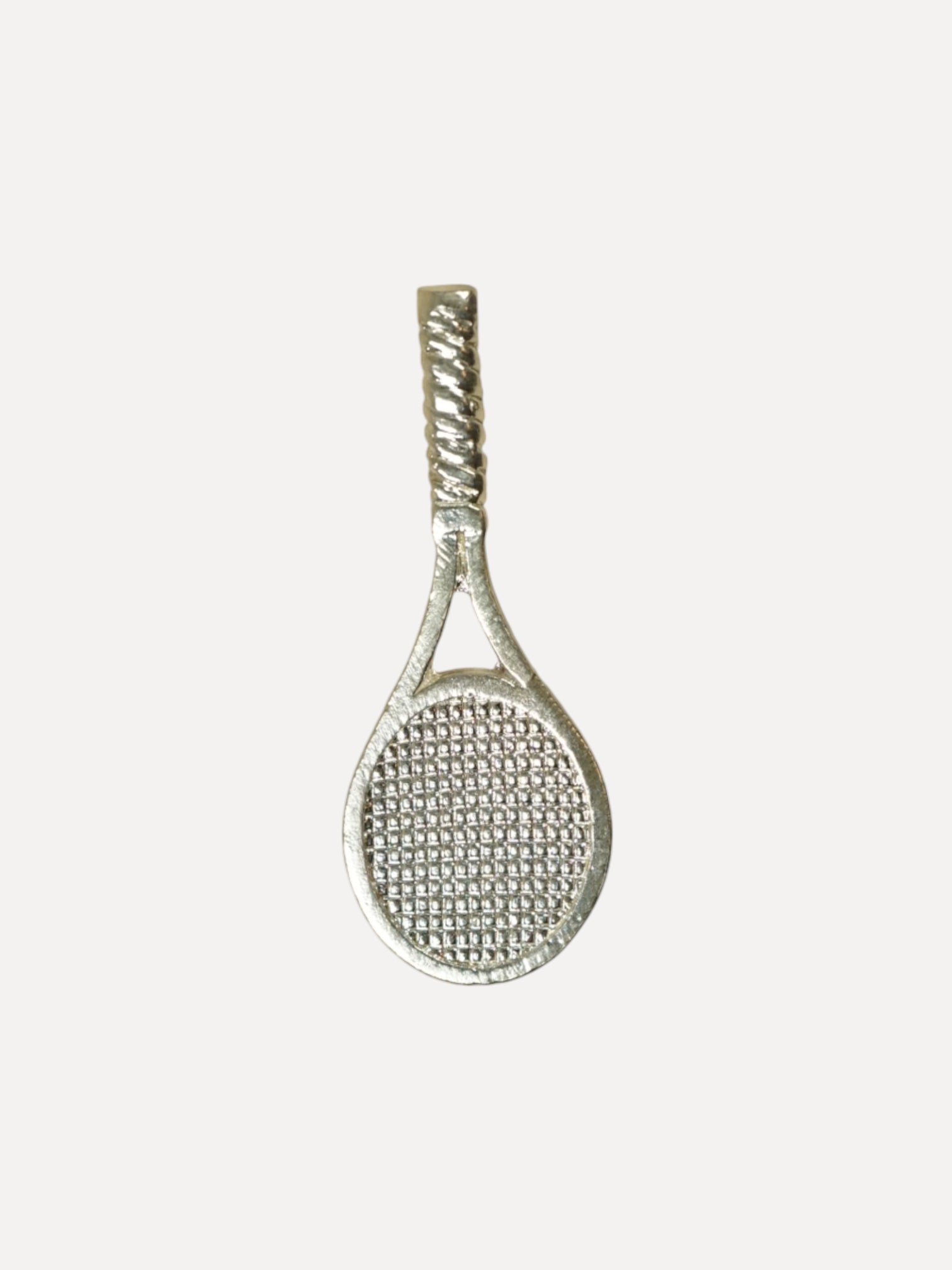 Silver tennis racket pendant on a white background