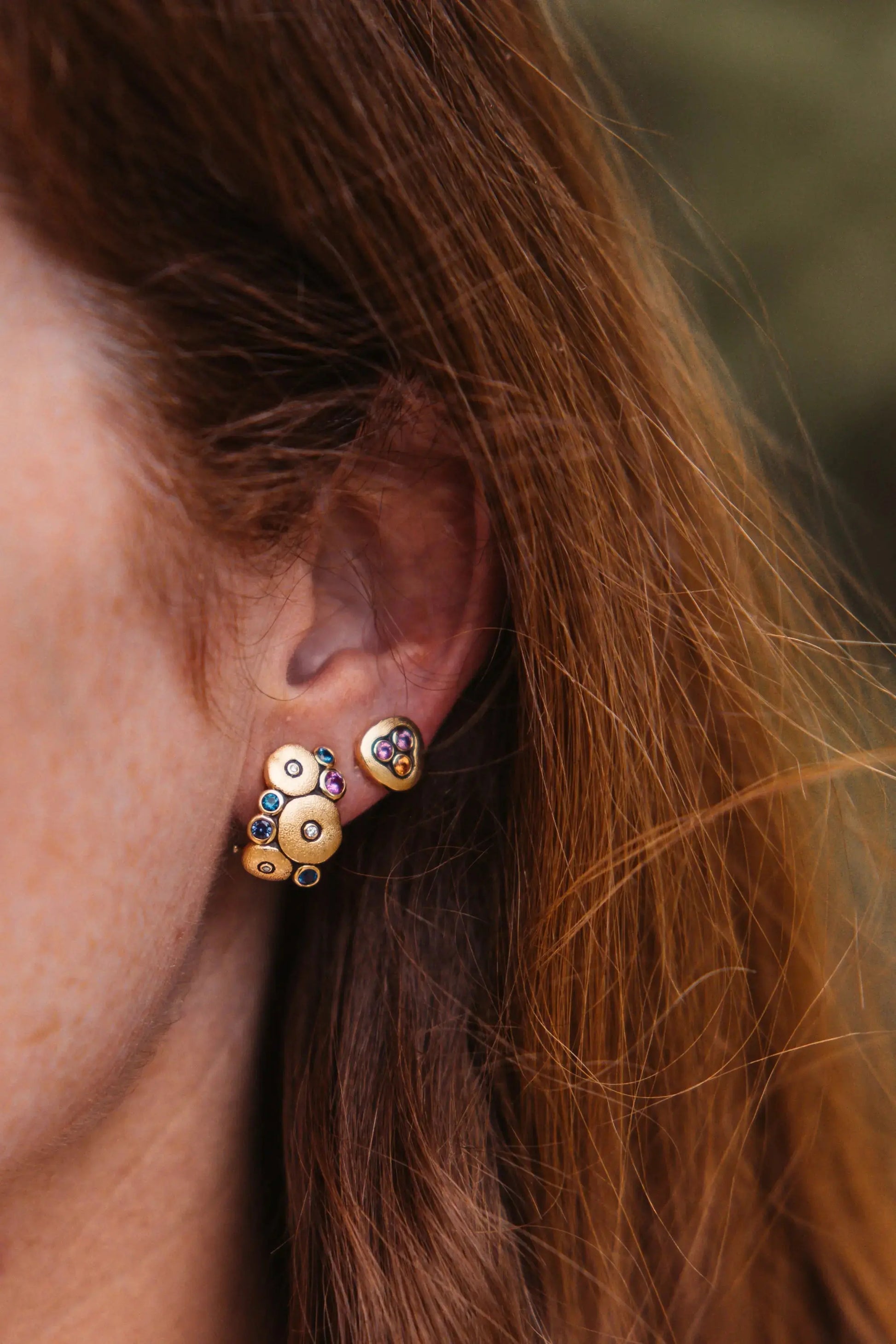 18K Yellow Gold Sapphire "Swirling Water" Stud Earrings  Details: 6 pink and orange sapphires Designed by Alex Sepkus and made in NYC